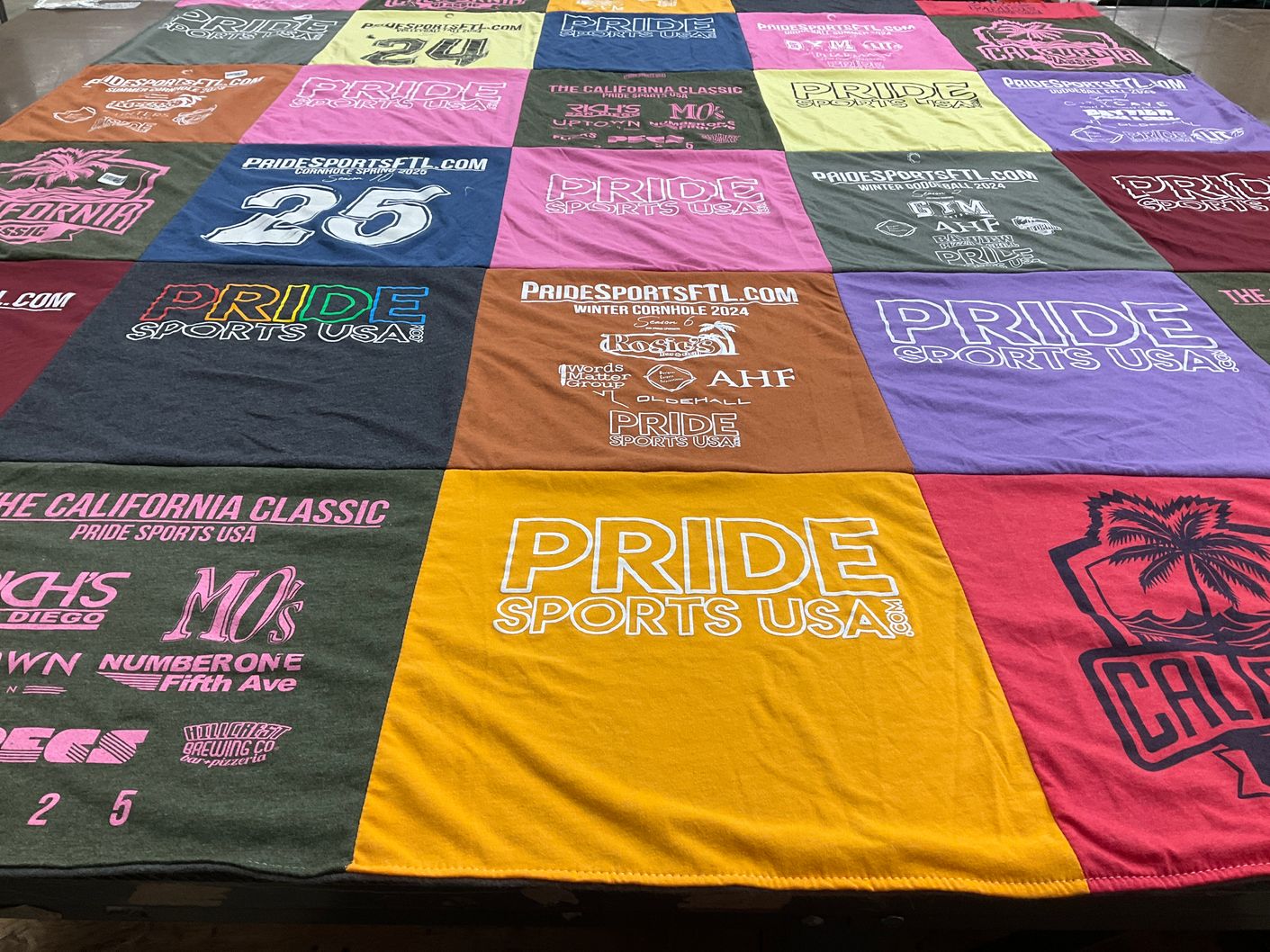 T-shirt quilt with sports, community events themes by Mike from FL