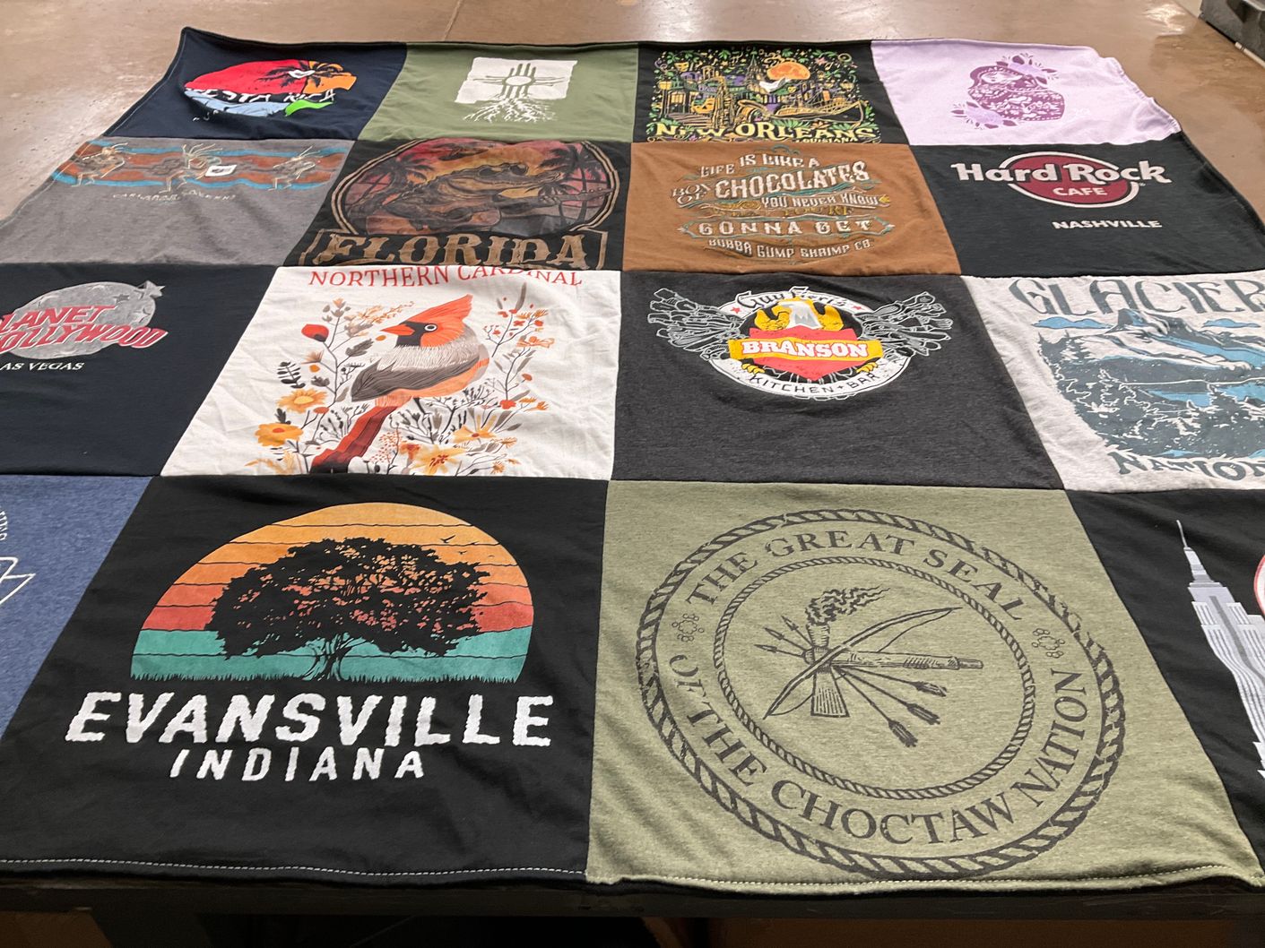T-shirt quilt with travel, souvenirs themes by Rebecca from TX