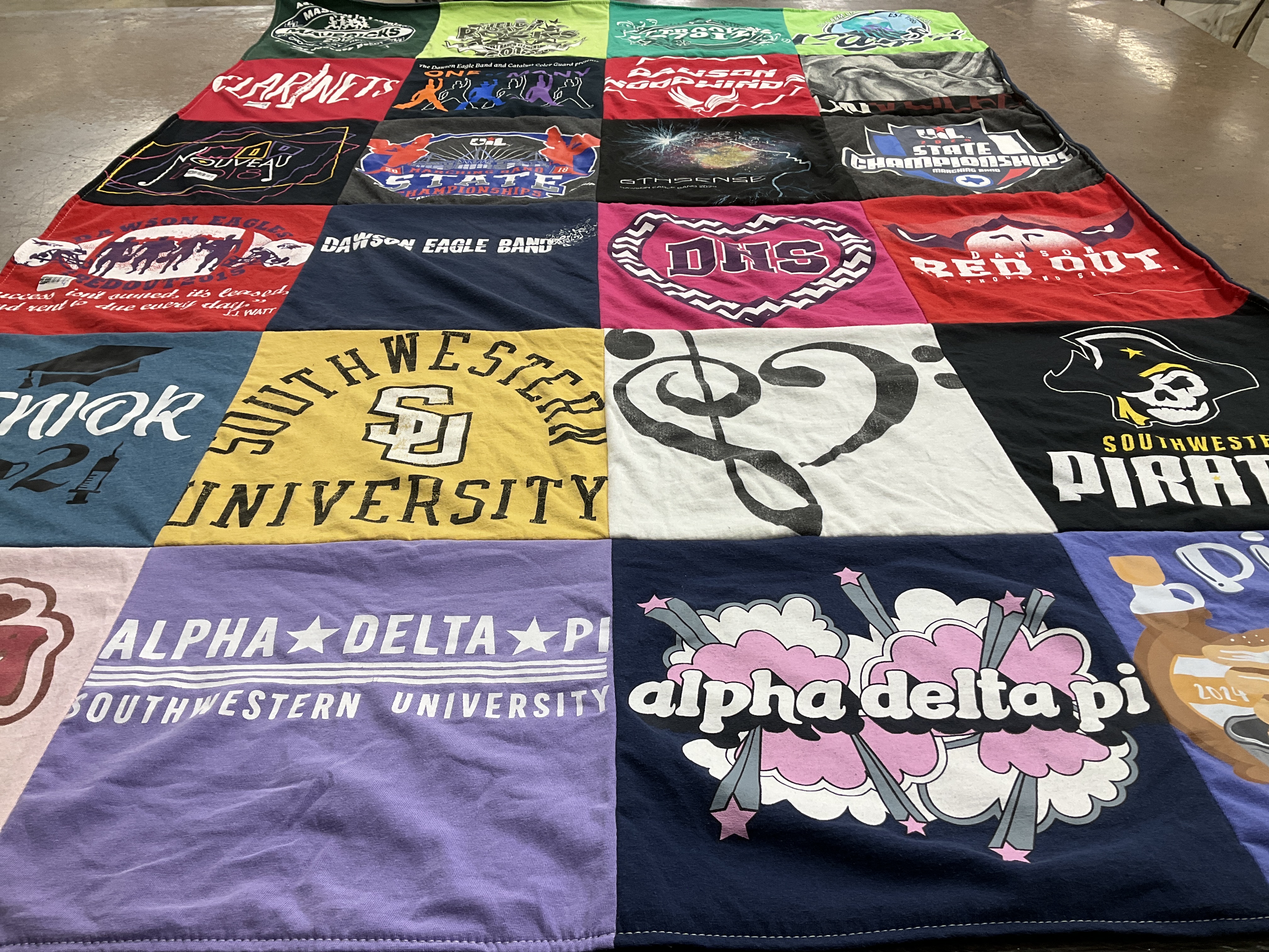 T-shirt quilt featuring dawson eagle band, southwestern pirates by Christina from TX
