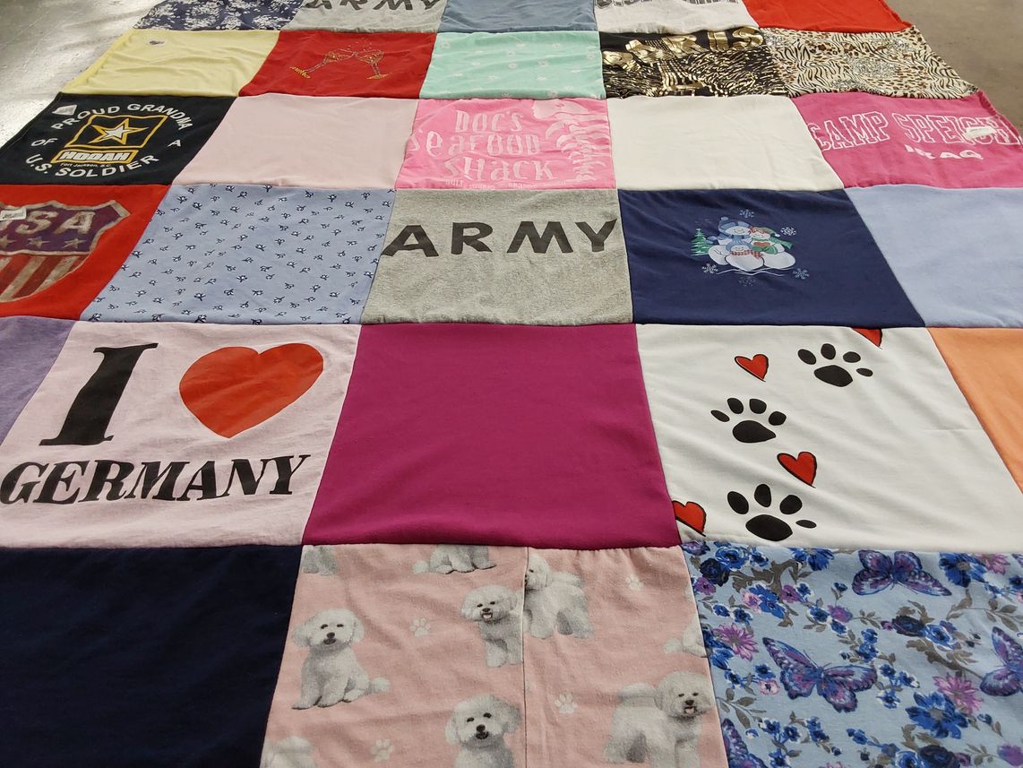 T-shirt quilt with military, pets themes by Donald from FL
