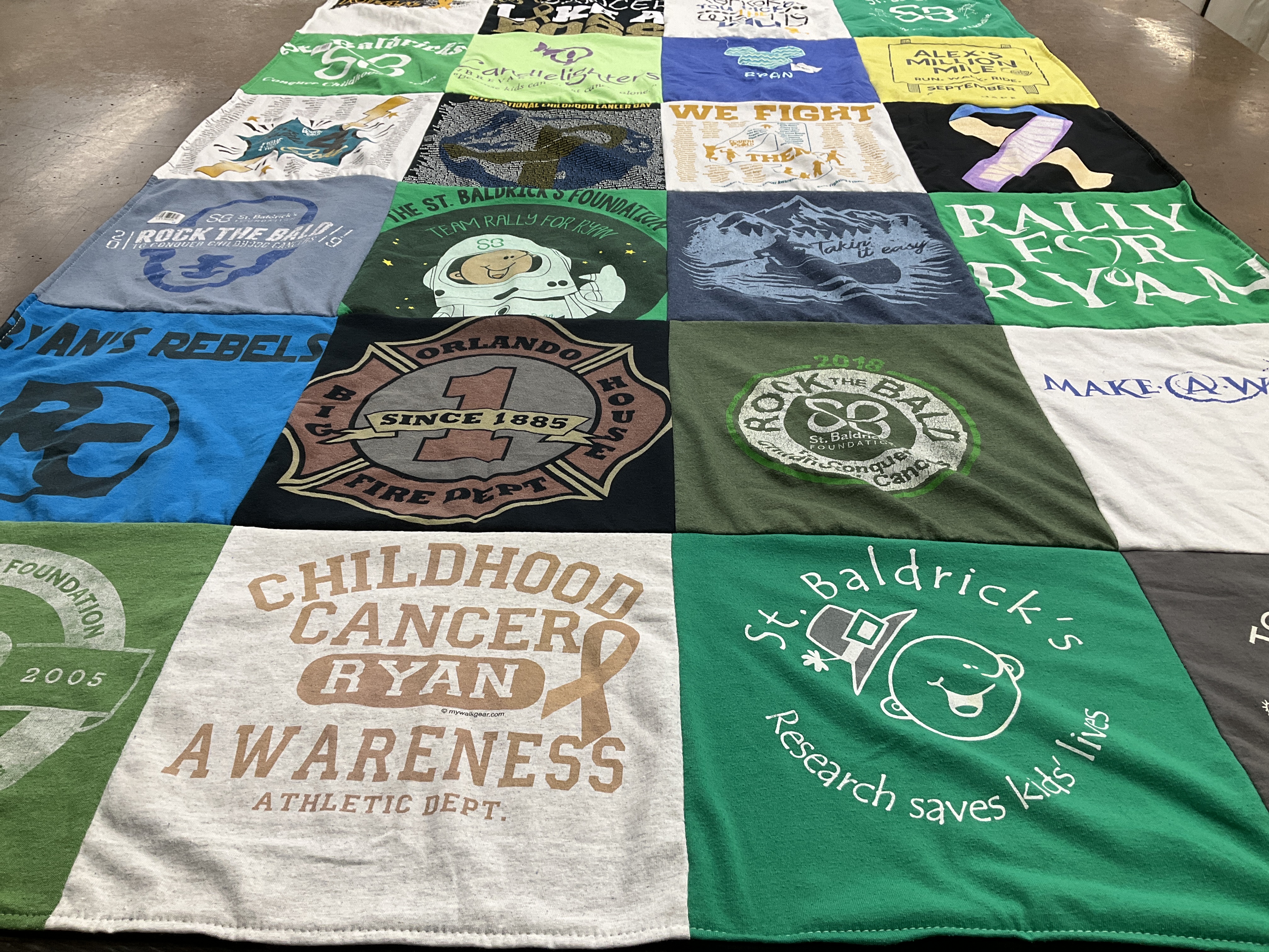 T-shirt quilt with childhood cancer awareness, fundraising themes by Carter from FL