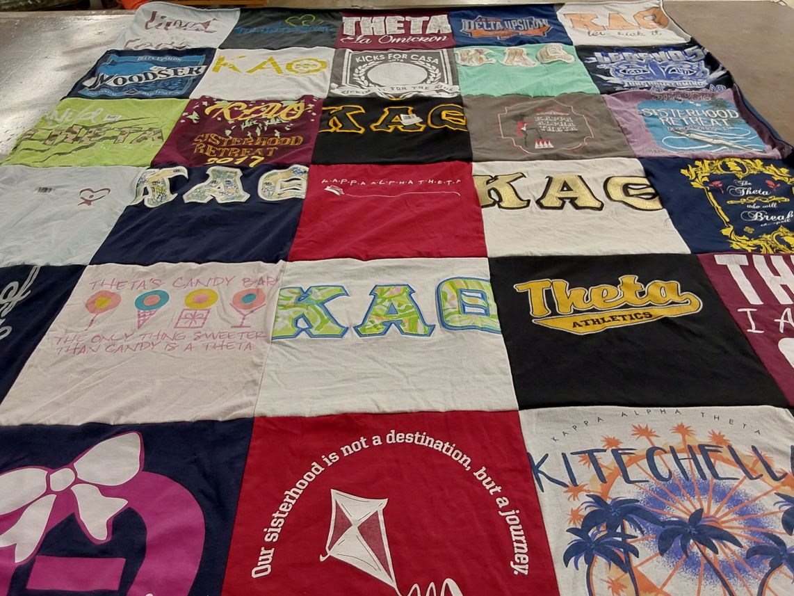 T-shirt quilt with sisterhood, sports themes by Teresa from FL
