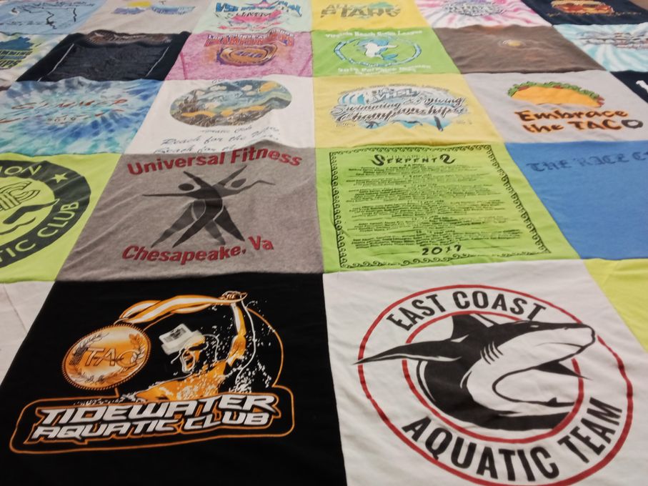 T-shirt quilt with swimming, fitness themes by Tracie from VA