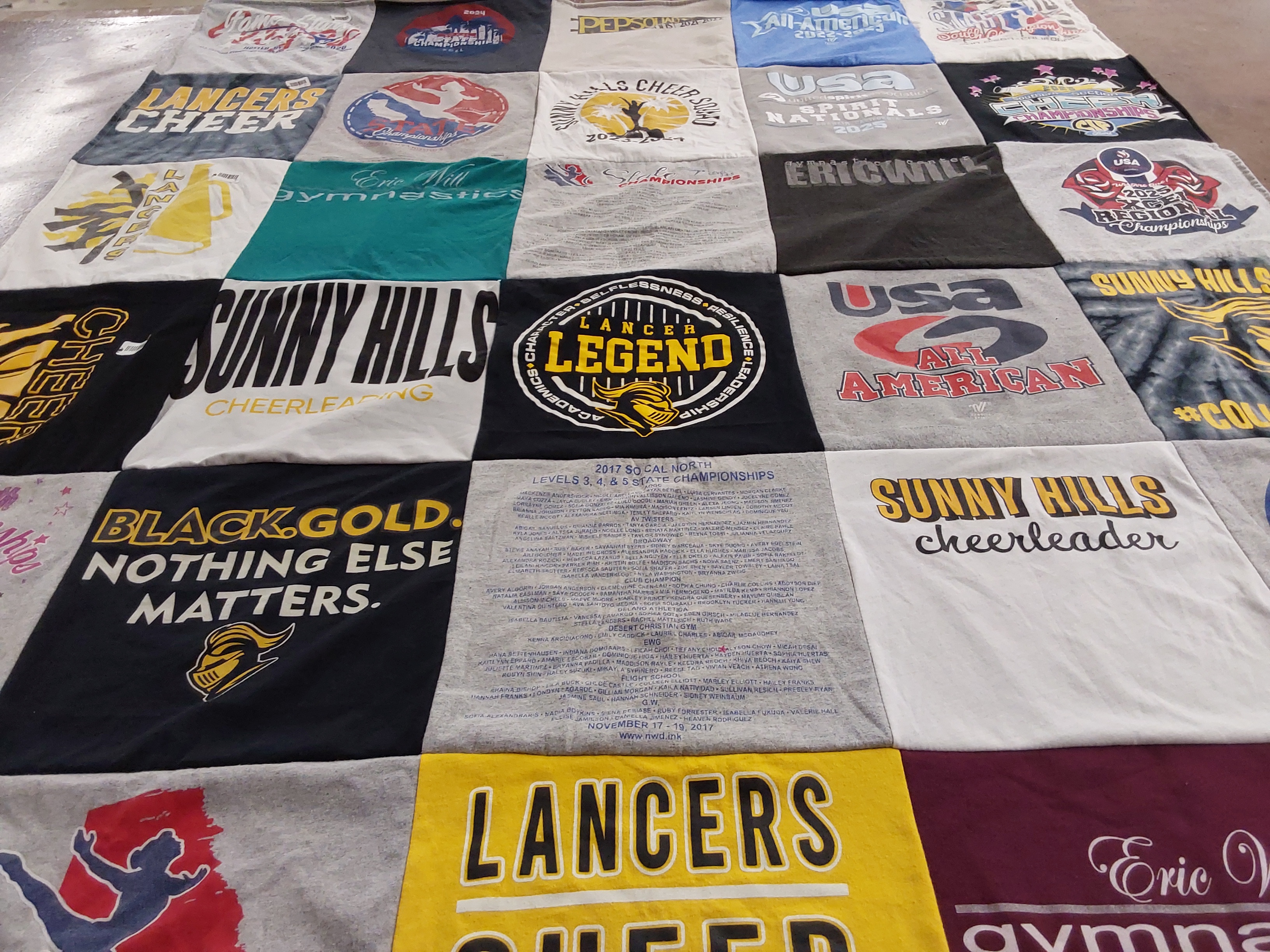 T-shirt quilt featuring lancers cheer by Pamela from CA
