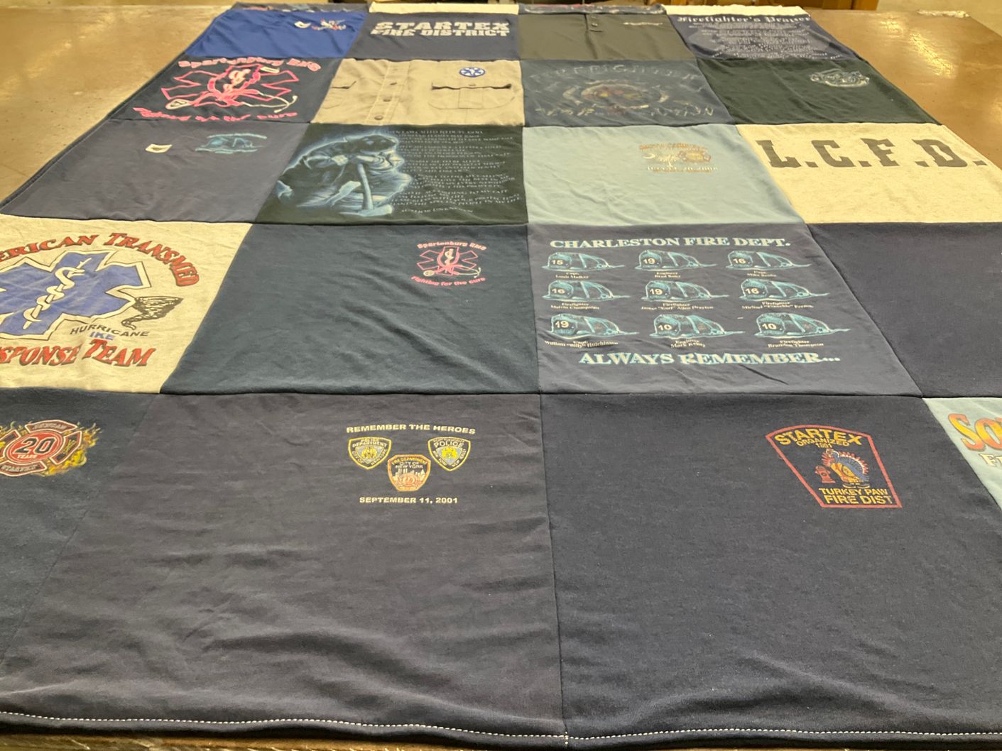 T-shirt quilt with firefighting, honoring first responders themes by Larry from SC