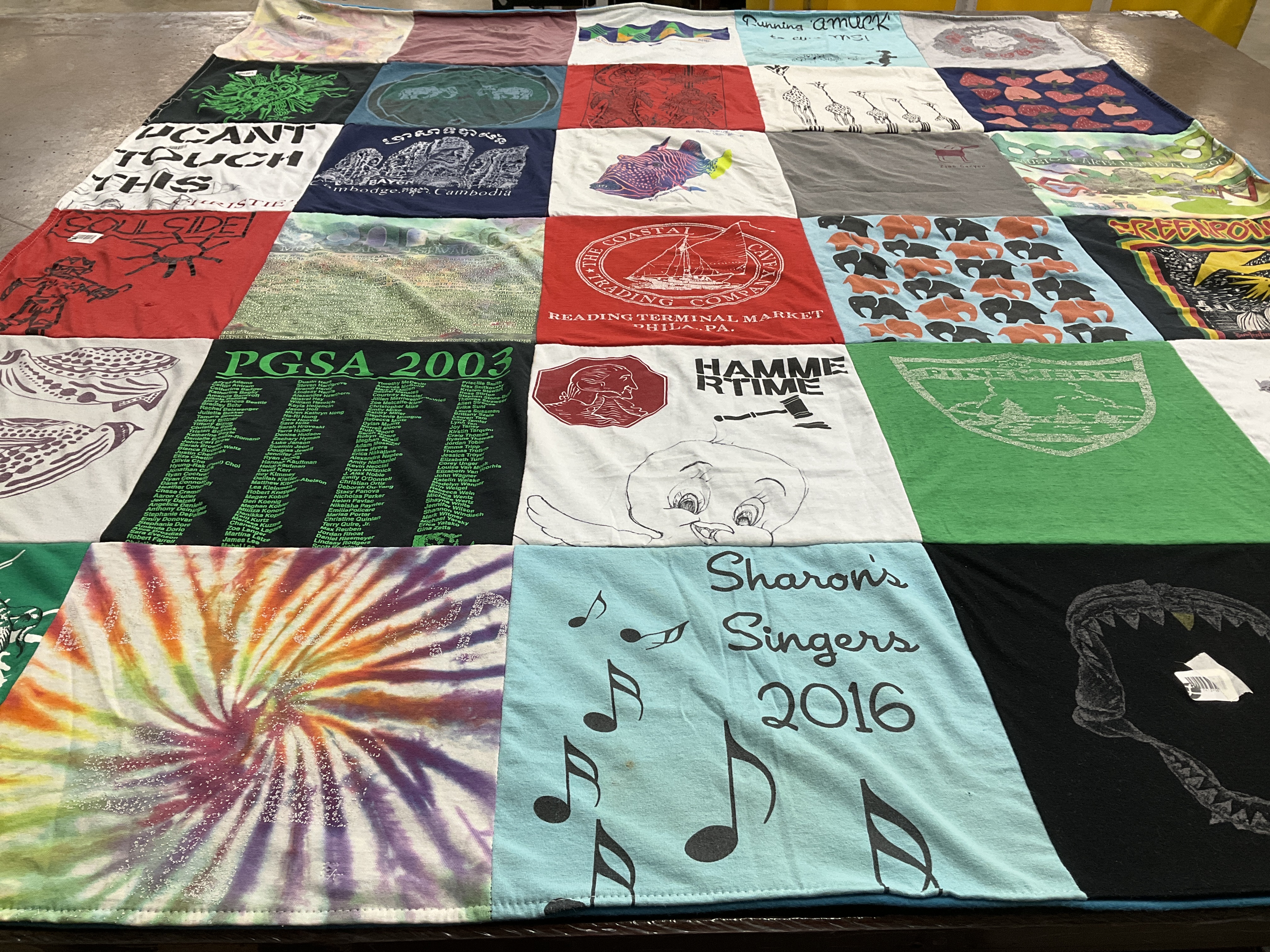 T-shirt quilt with music, cultural events themes by Hannah from PA