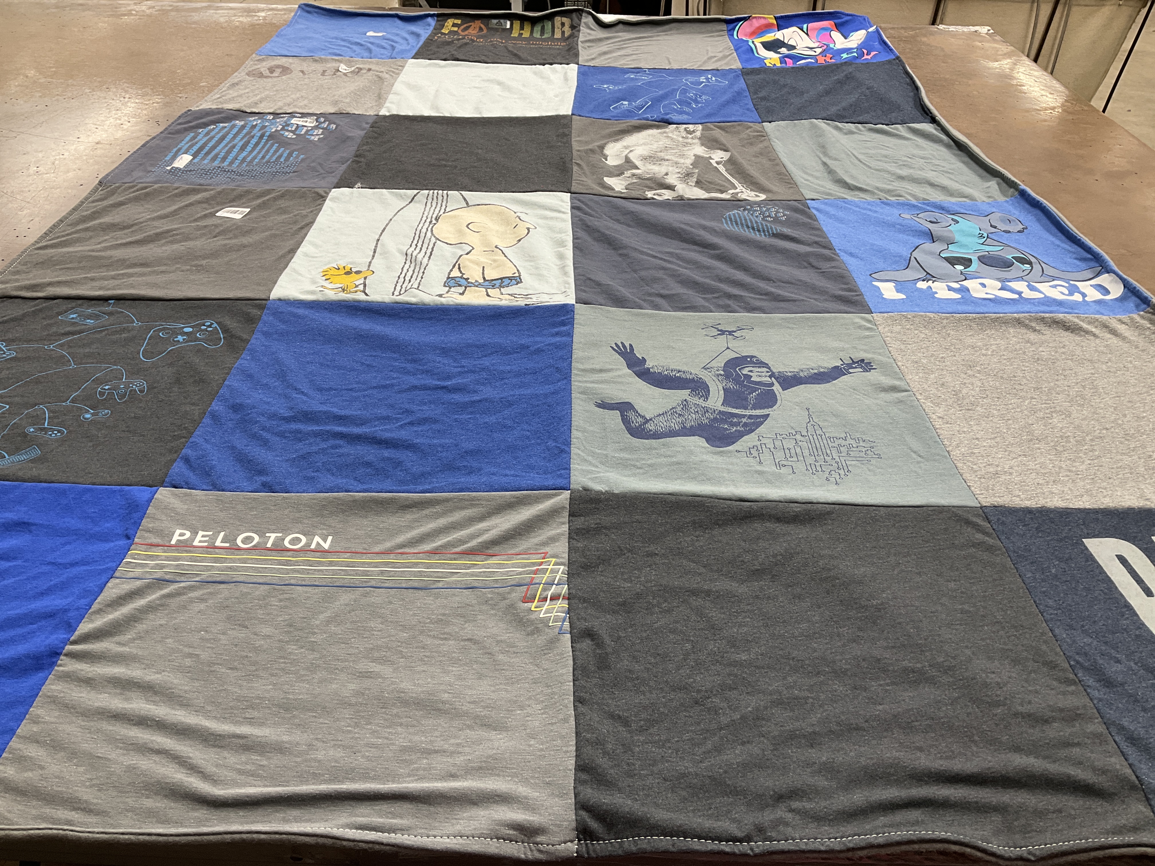 T-shirt quilt with fitness, gaming themes by Staci from CA
