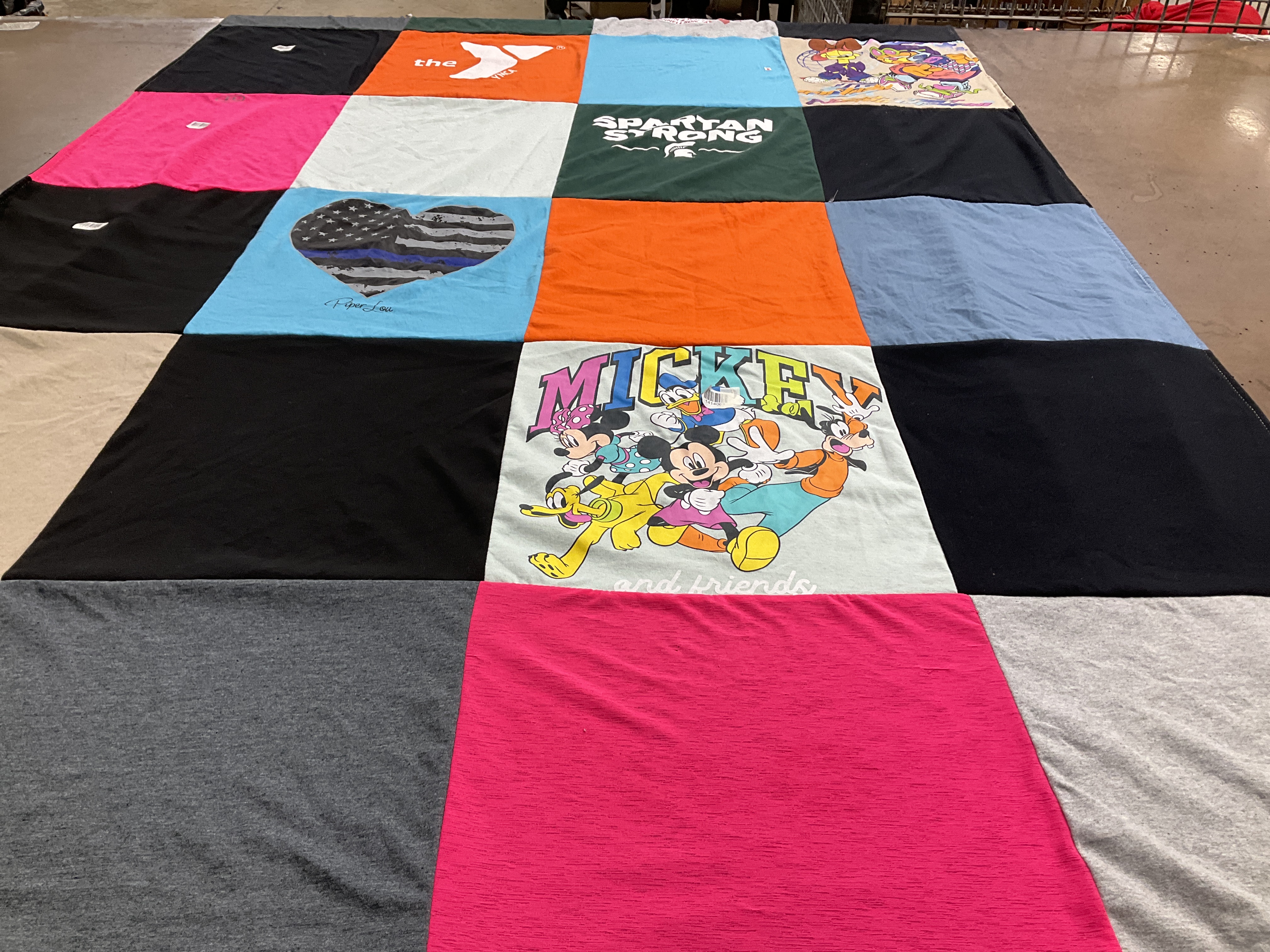 T-shirt quilt with disney, fitness themes by Jennifer from MI