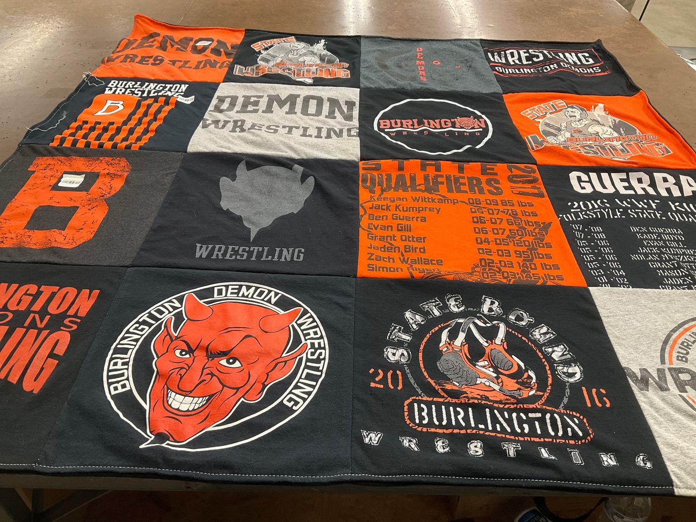 T-shirt quilt featuring burlington demons wrestling by Meghan from WI