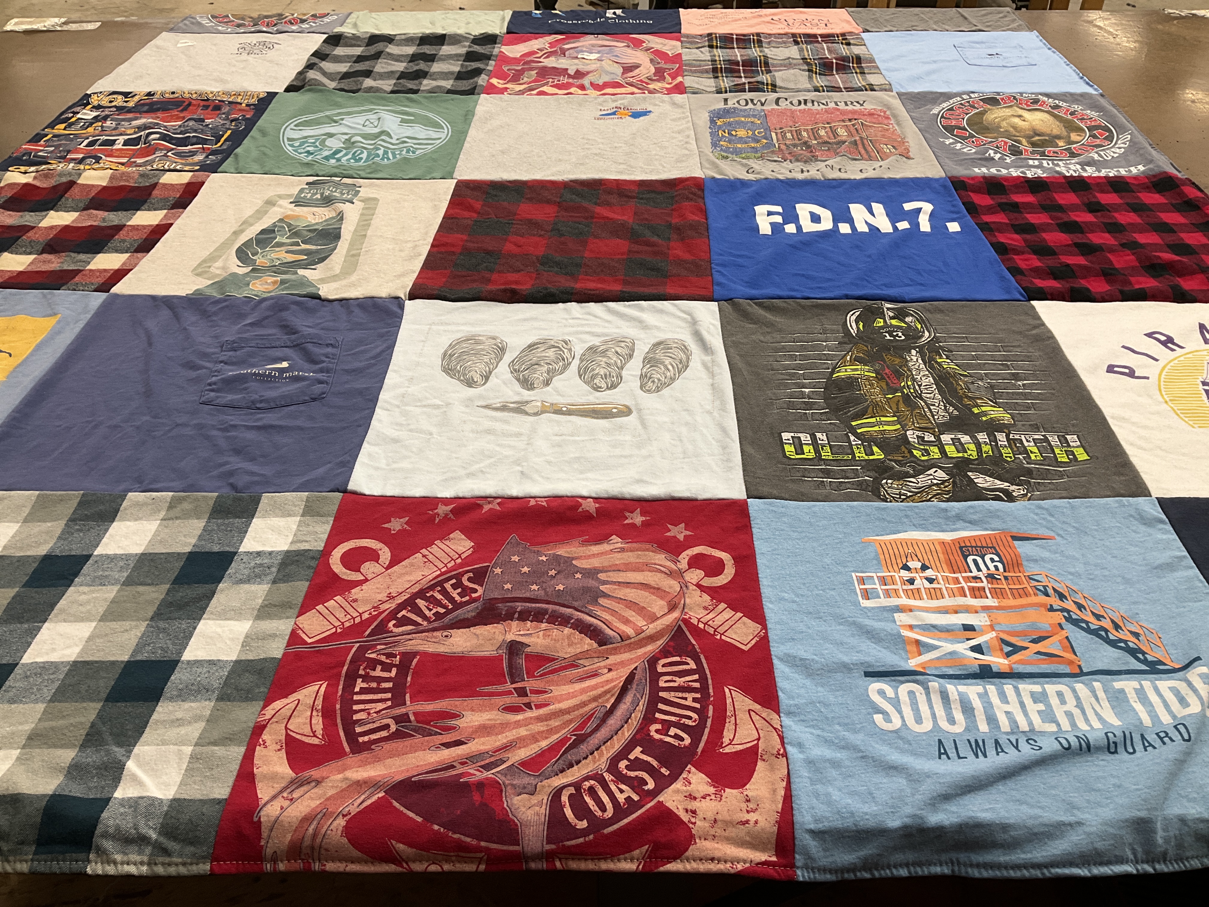 T-shirt quilt with firefighting, nautical themes by Mary from NC