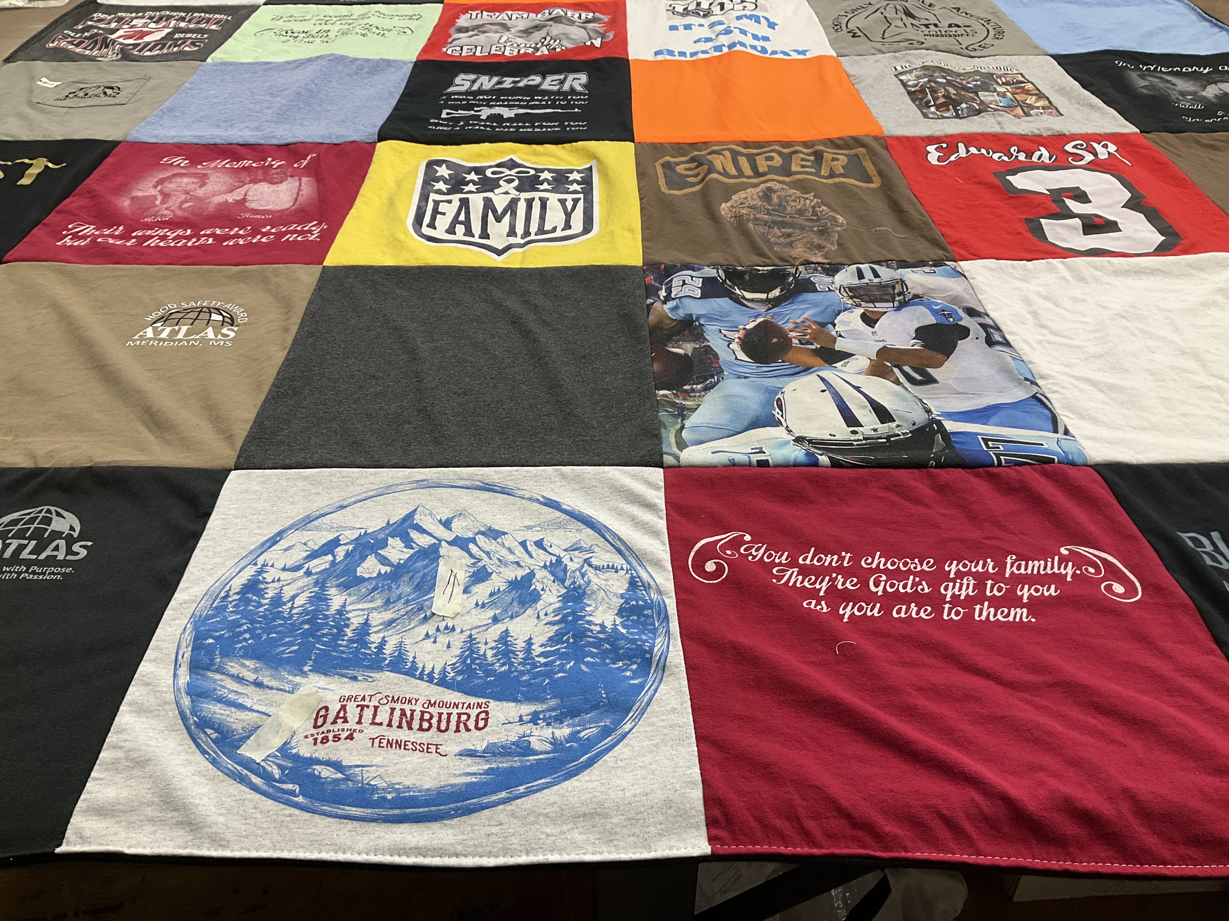 T-shirt quilt with family, sports themes by Kewauna from MS