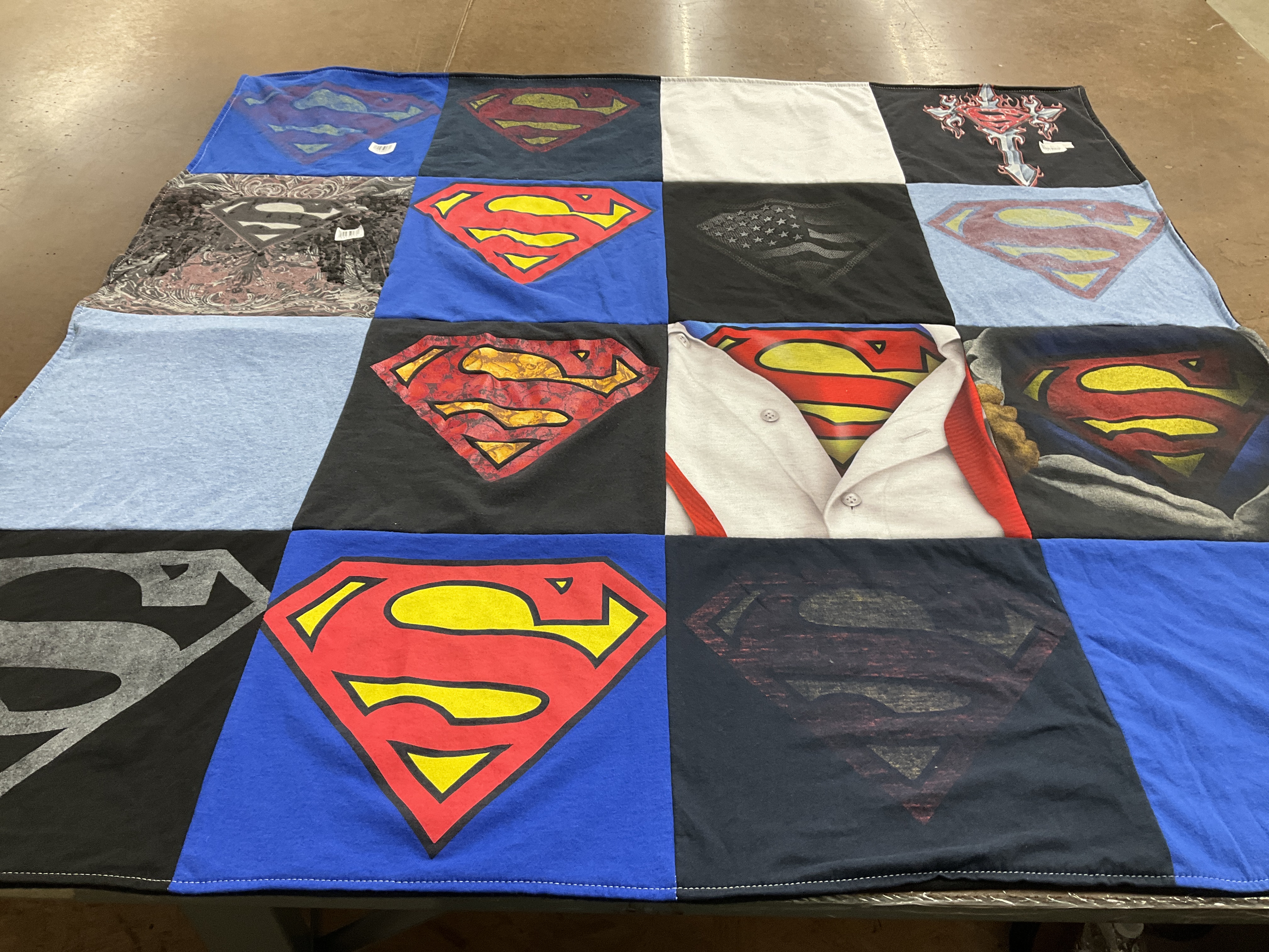 T-shirt quilt with comics, superheroes themes by Kathy from TX