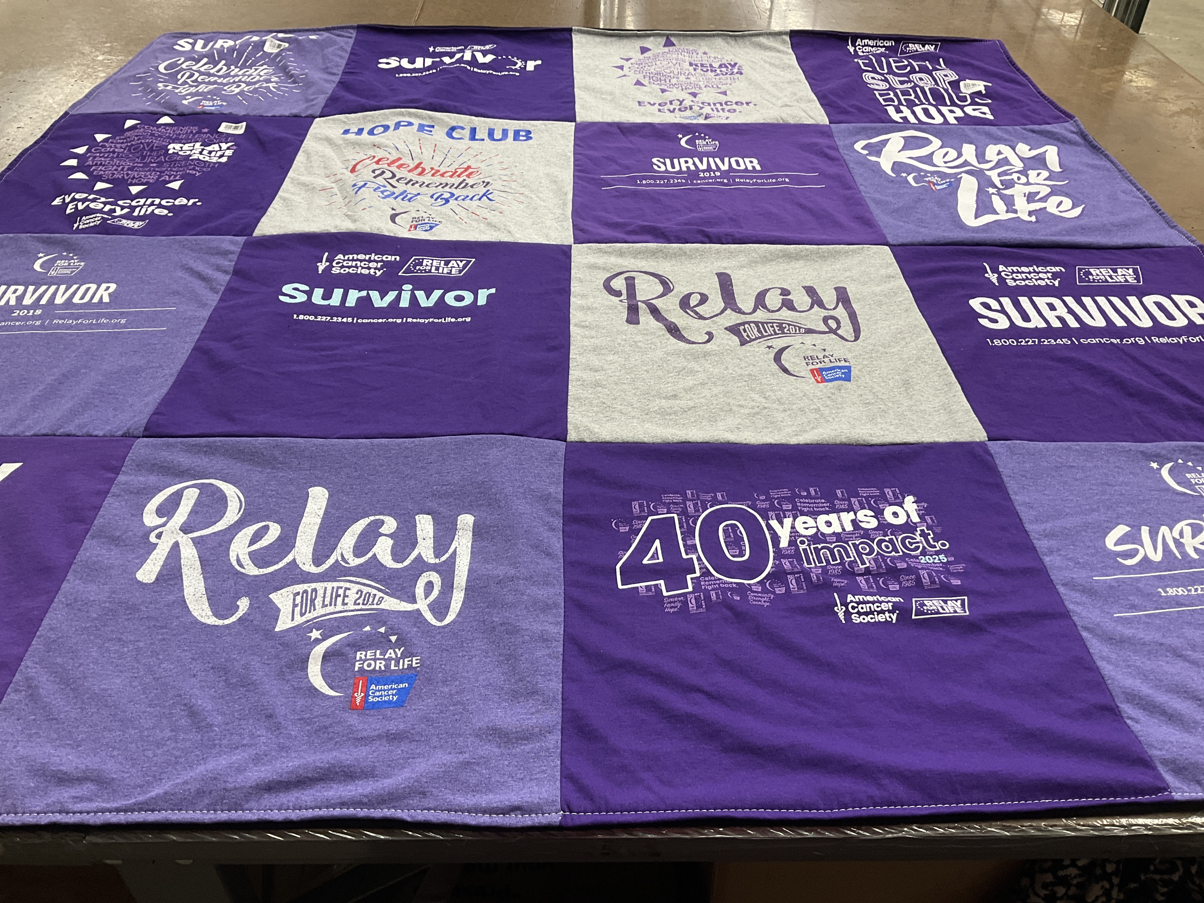 T-shirt quilt with cancer awareness, community support themes by Stephanie from MA