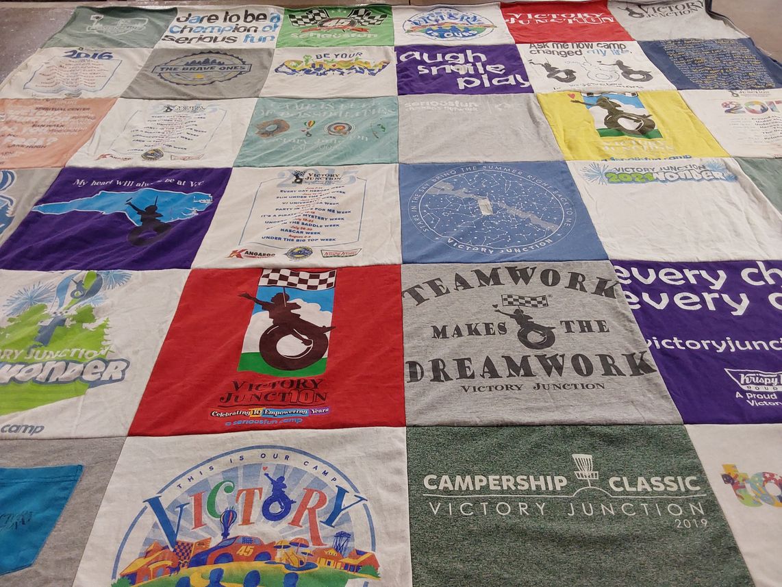 T-shirt quilt with camping, teamwork themes by Rachel from NC