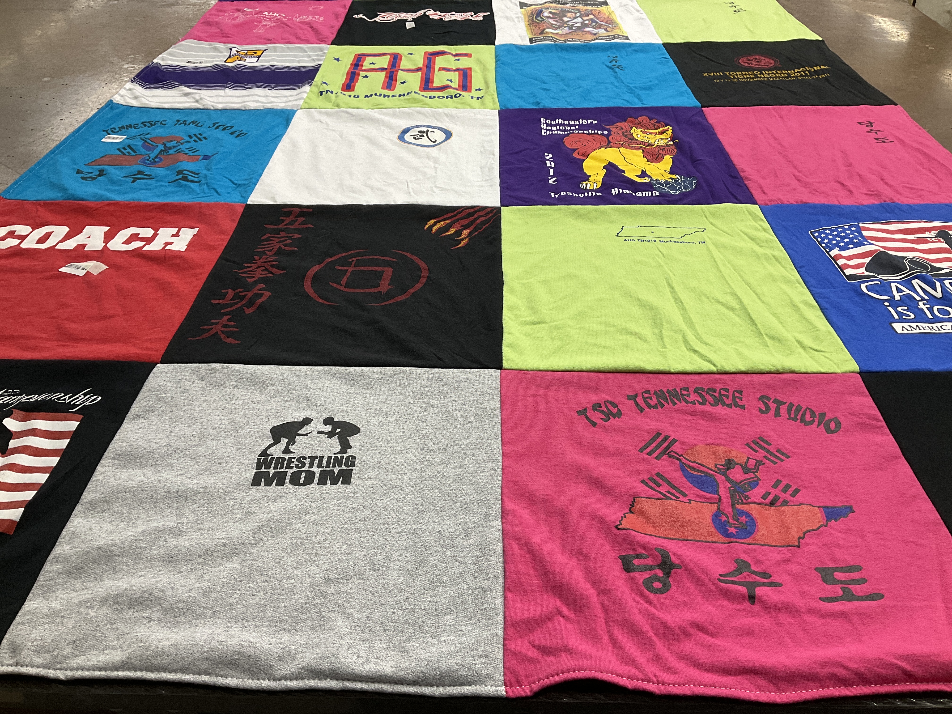 T-shirt quilt with wrestling, fitness themes by Mildred from TN