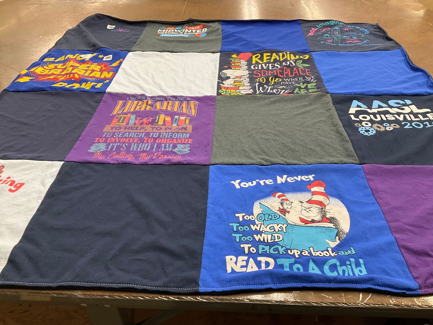 T-shirt quilt with literacy, reading themes by Linda from SC