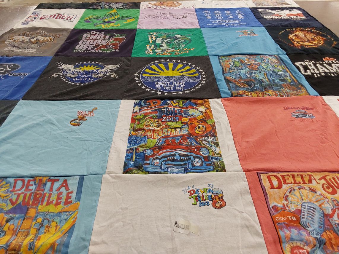 T-shirt quilt with music, festivals themes by Laura from MS