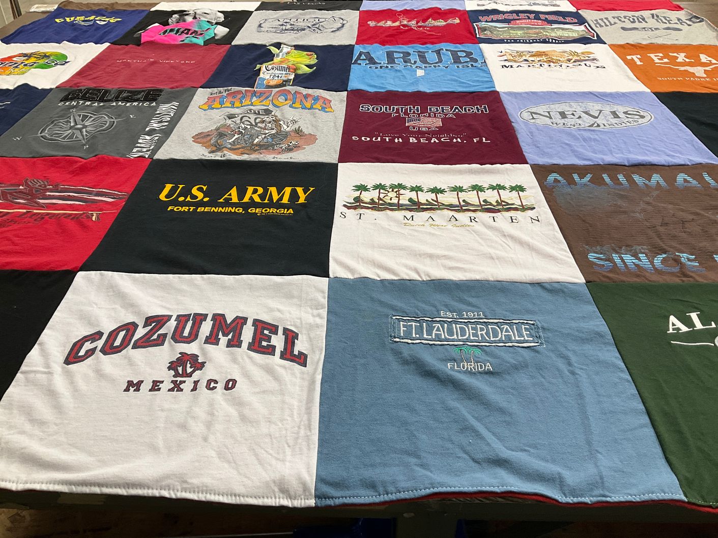 T-shirt quilt with travel, military themes by Sergio from TX