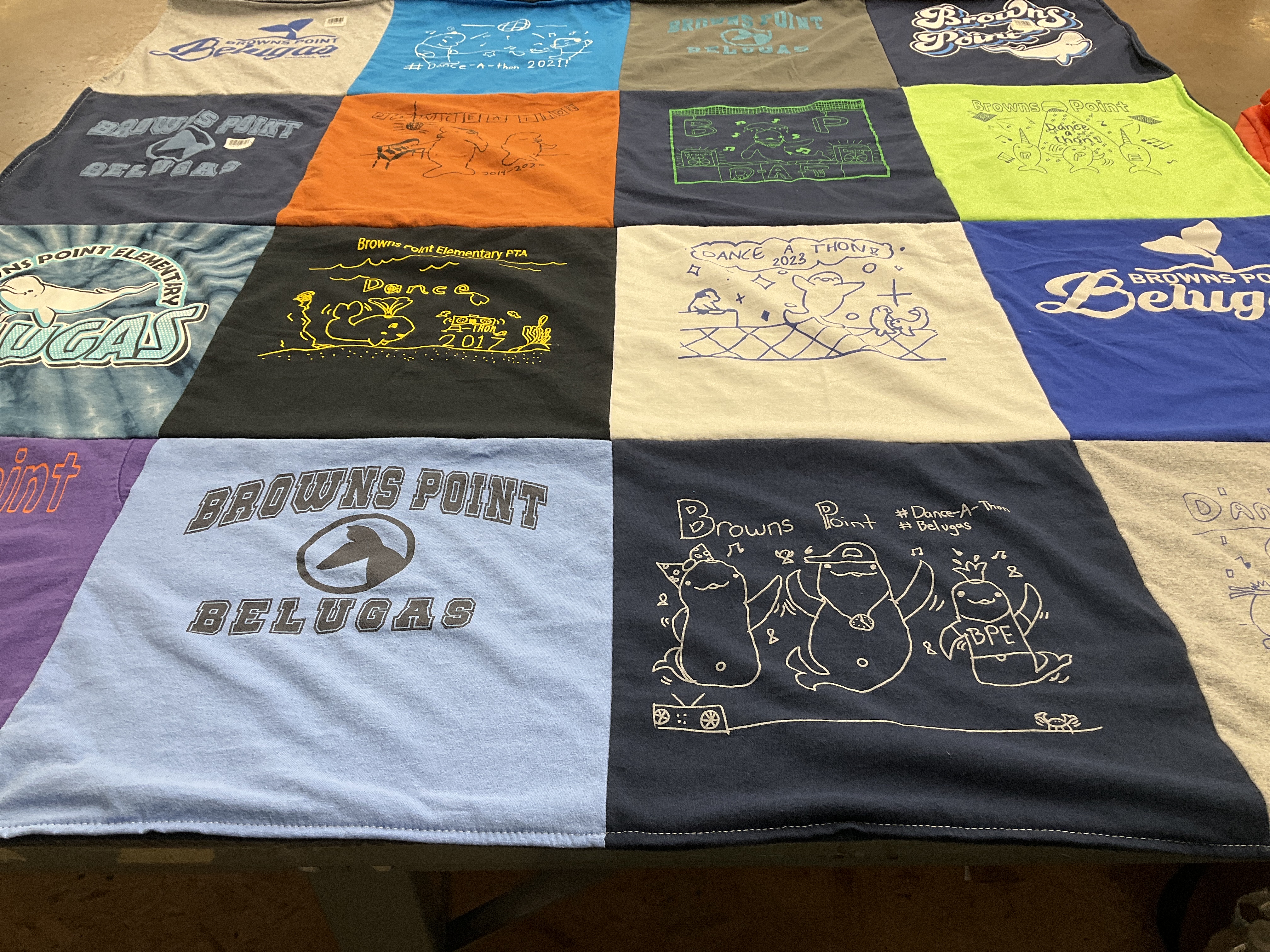 T-shirt quilt featuring browns point belugas by Shannon from WA