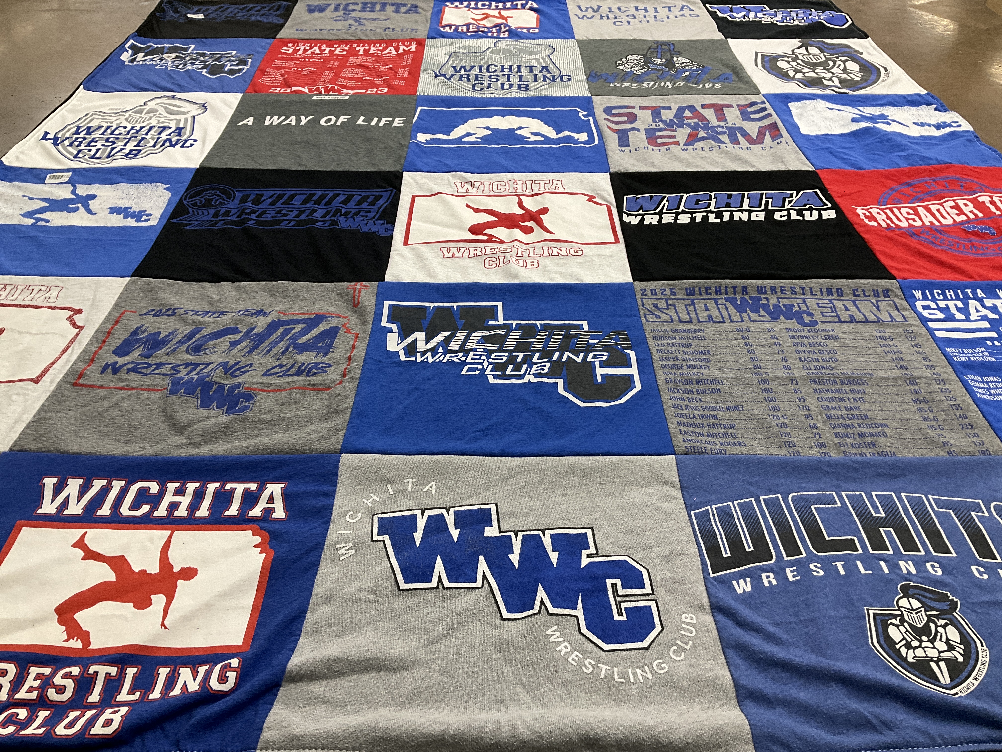 T-shirt quilt with wrestling, sports themes by LINDSAY from KS