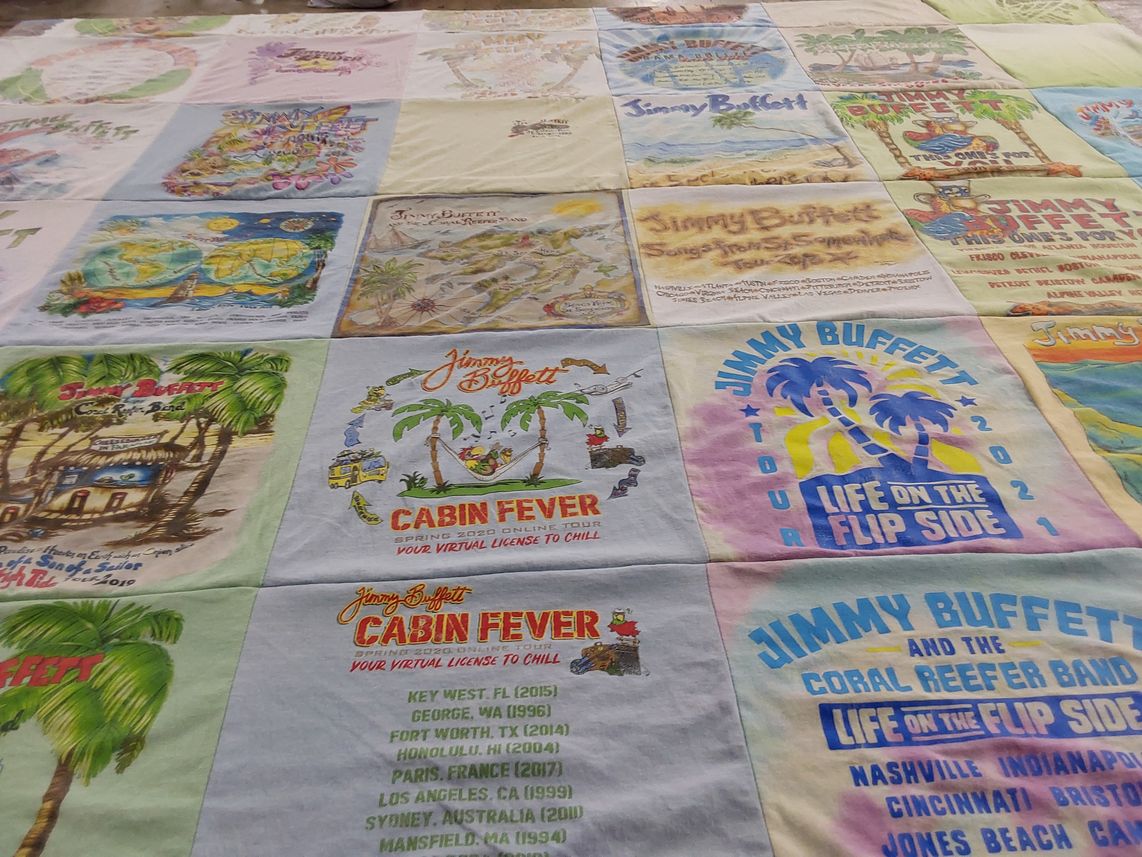 T-shirt quilt with music, travel themes by Donna from TN