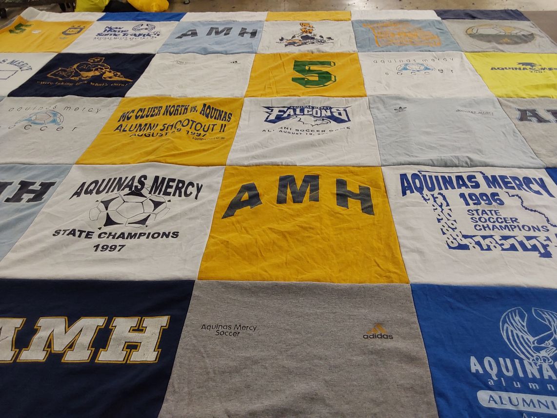 T-shirt quilt featuring aquinas mercy soccer by Jeff from MO