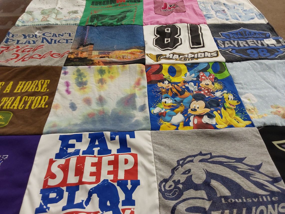 T-shirt quilt with sports, disney themes by Angela from NJ