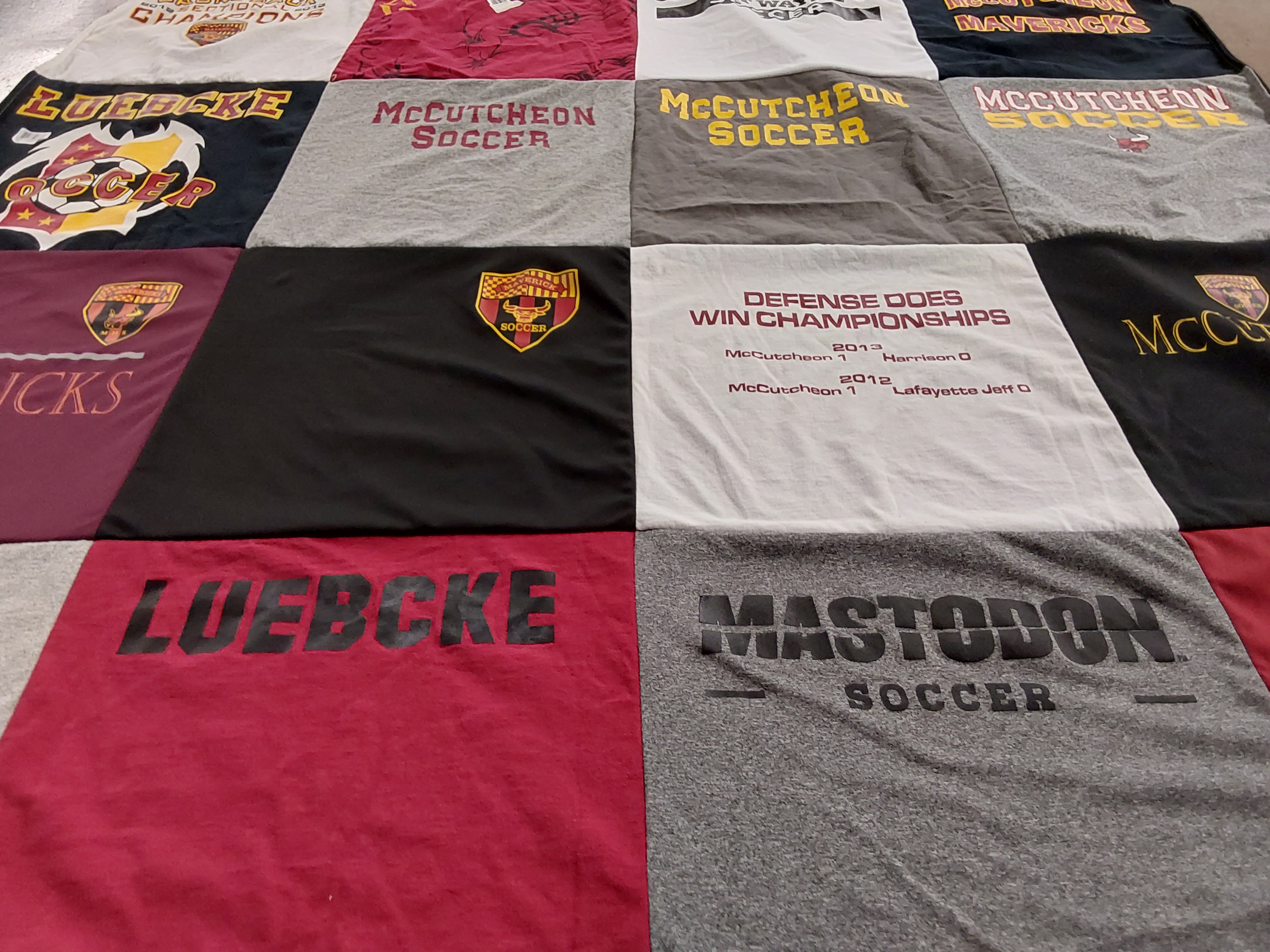 T-shirt quilt featuring mccutcheon soccer, mastodon soccer by Keith from IN