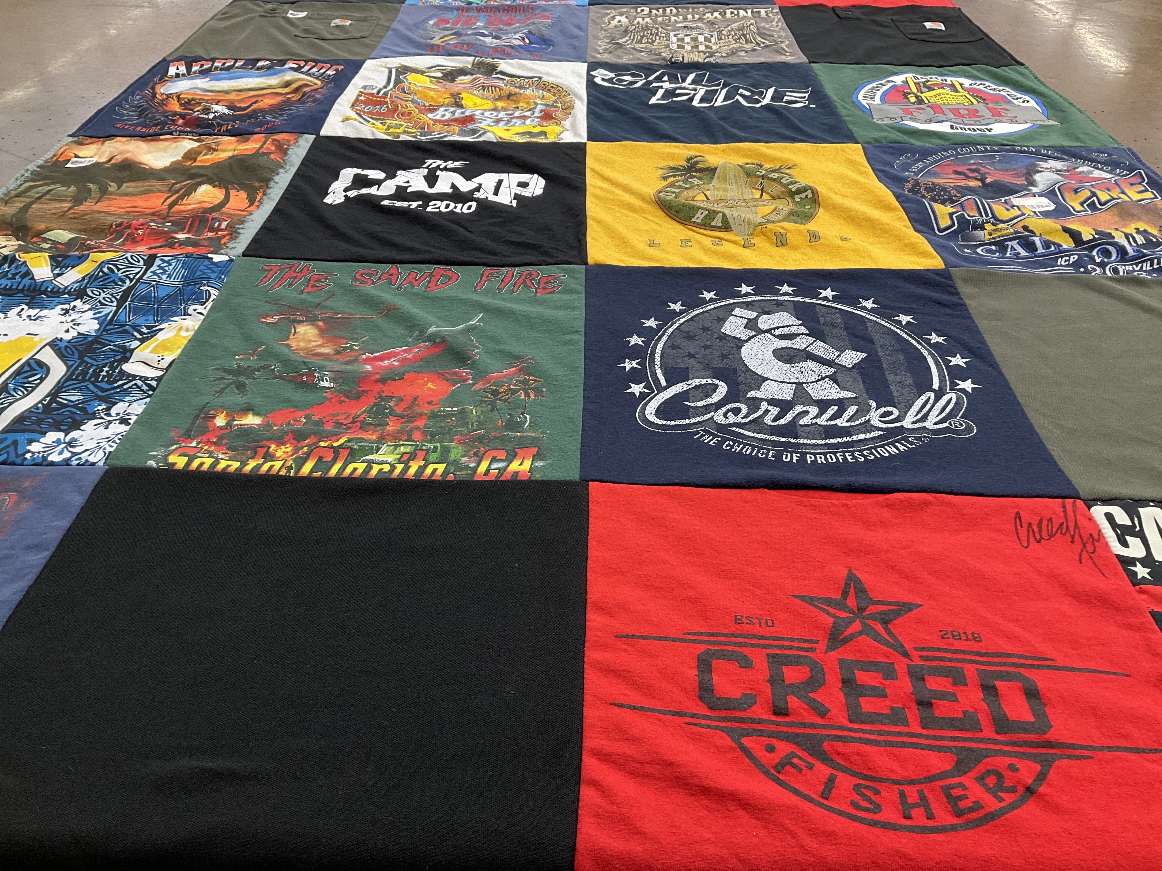 T-shirt quilt with firefighting, outdoor activities themes by Brandy from CA