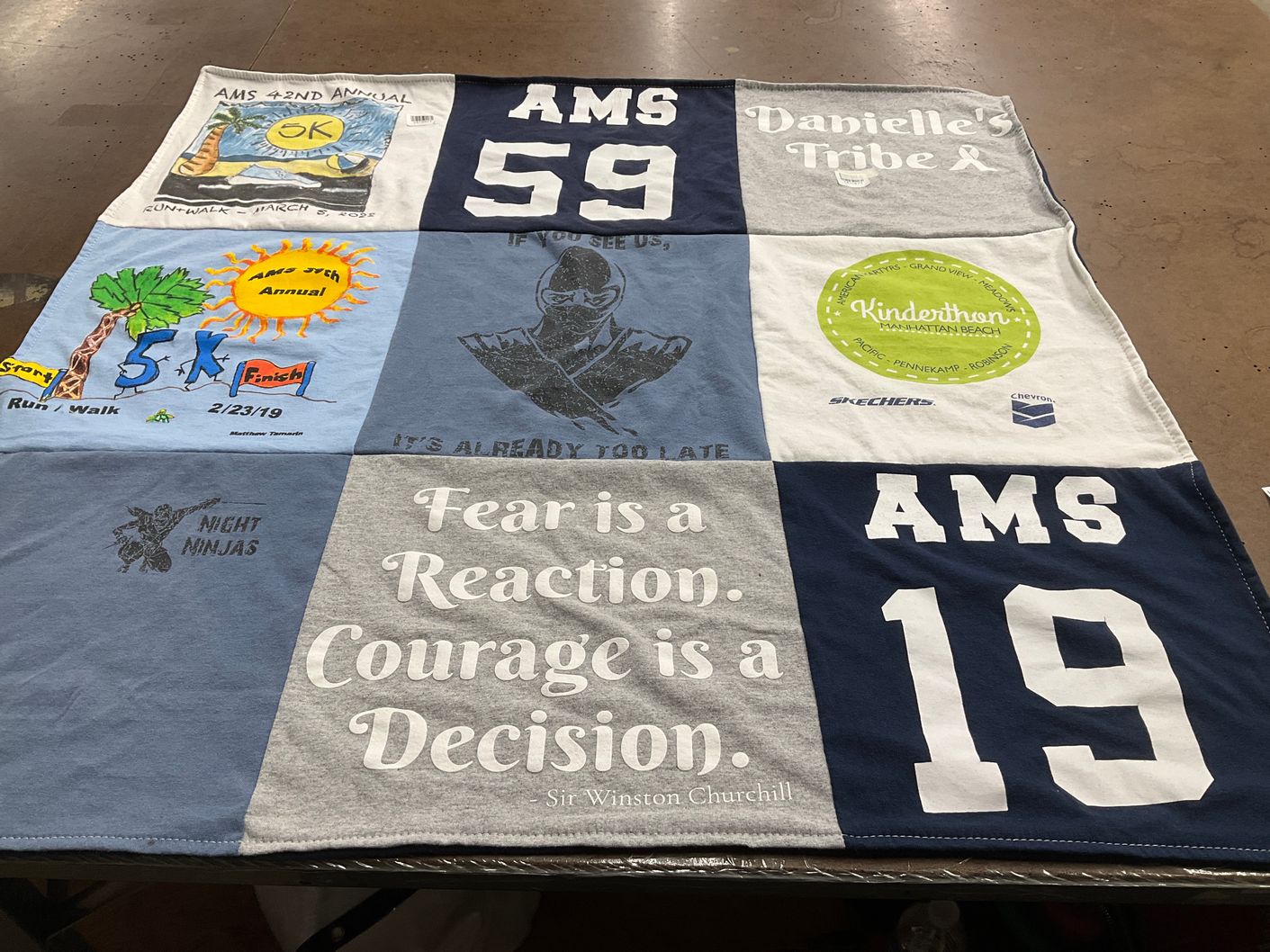 T-shirt quilt with running, walking themes by Kerry from CA