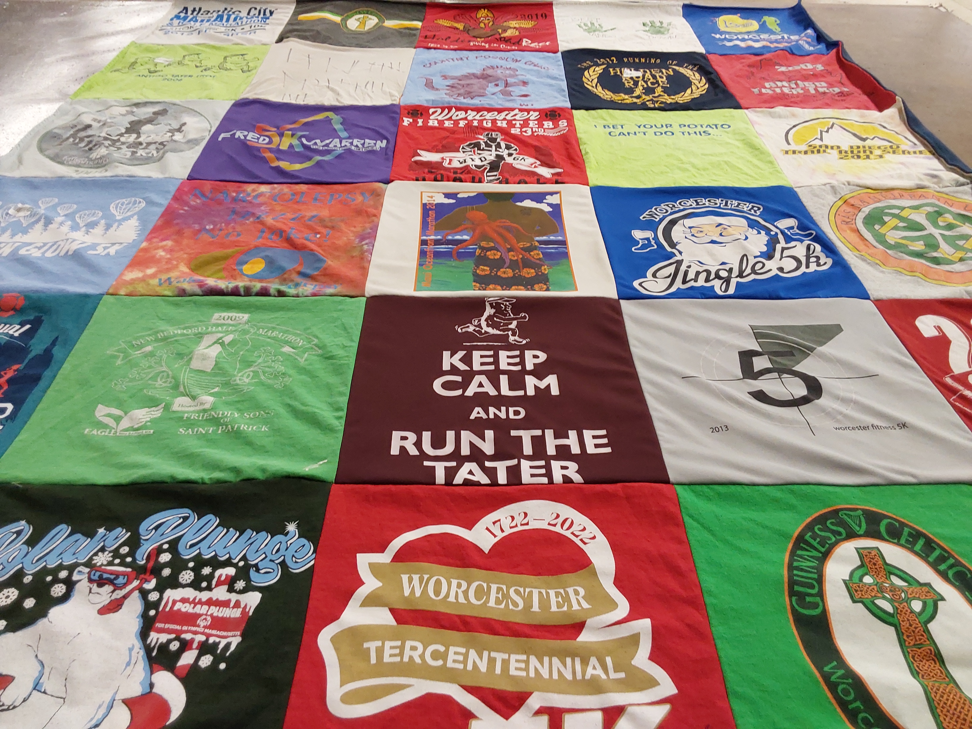 T-shirt quilt with running, community events themes by Jared from MA
