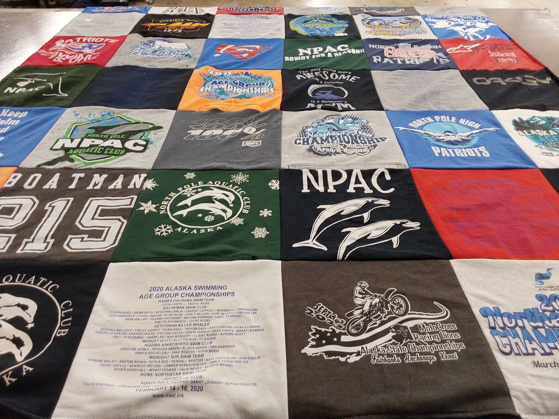 T-shirt quilt featuring north pole aquatic club by Kristi from AK