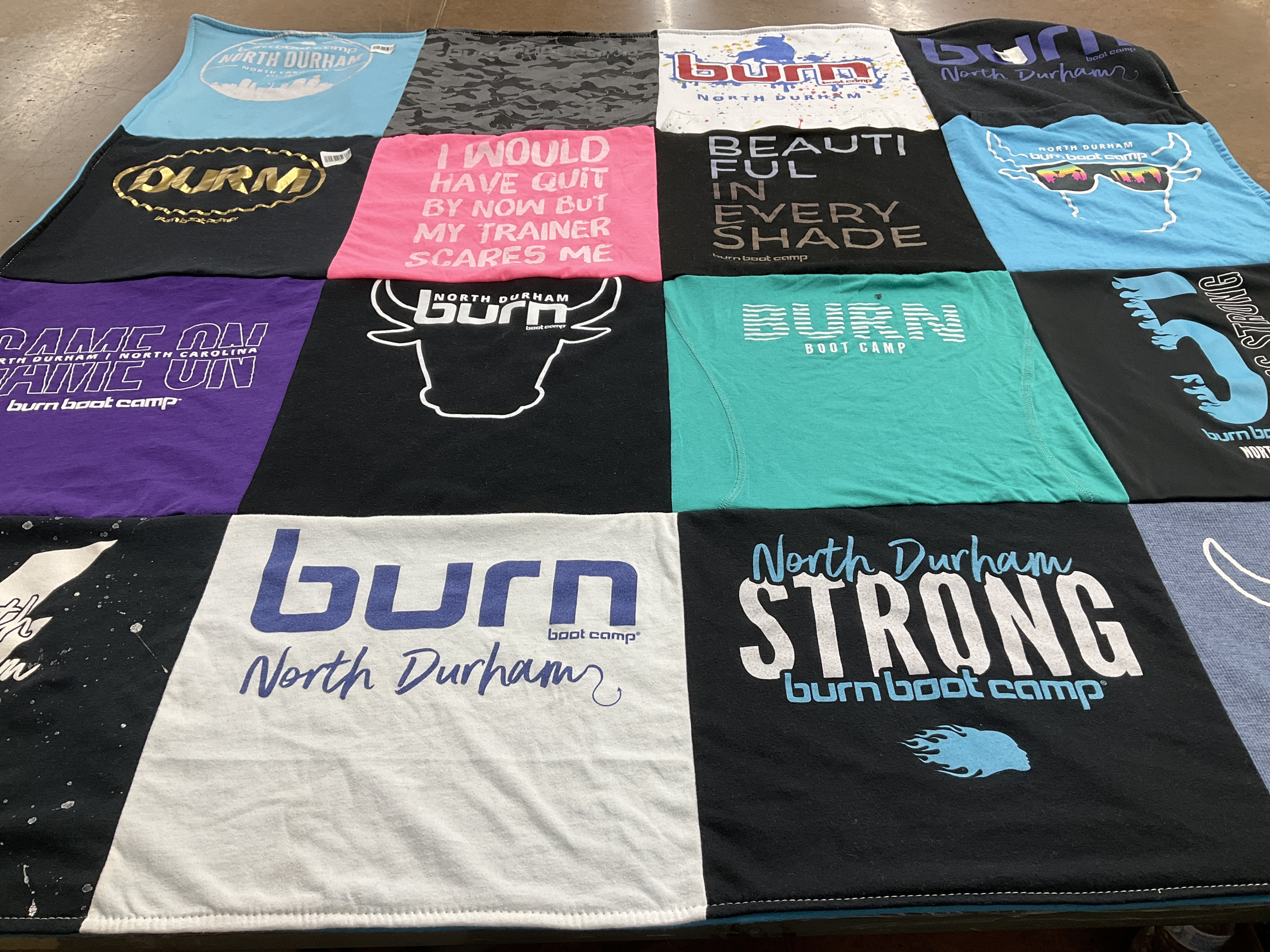 T-shirt quilt with fitness, exercise themes by Robin from NC