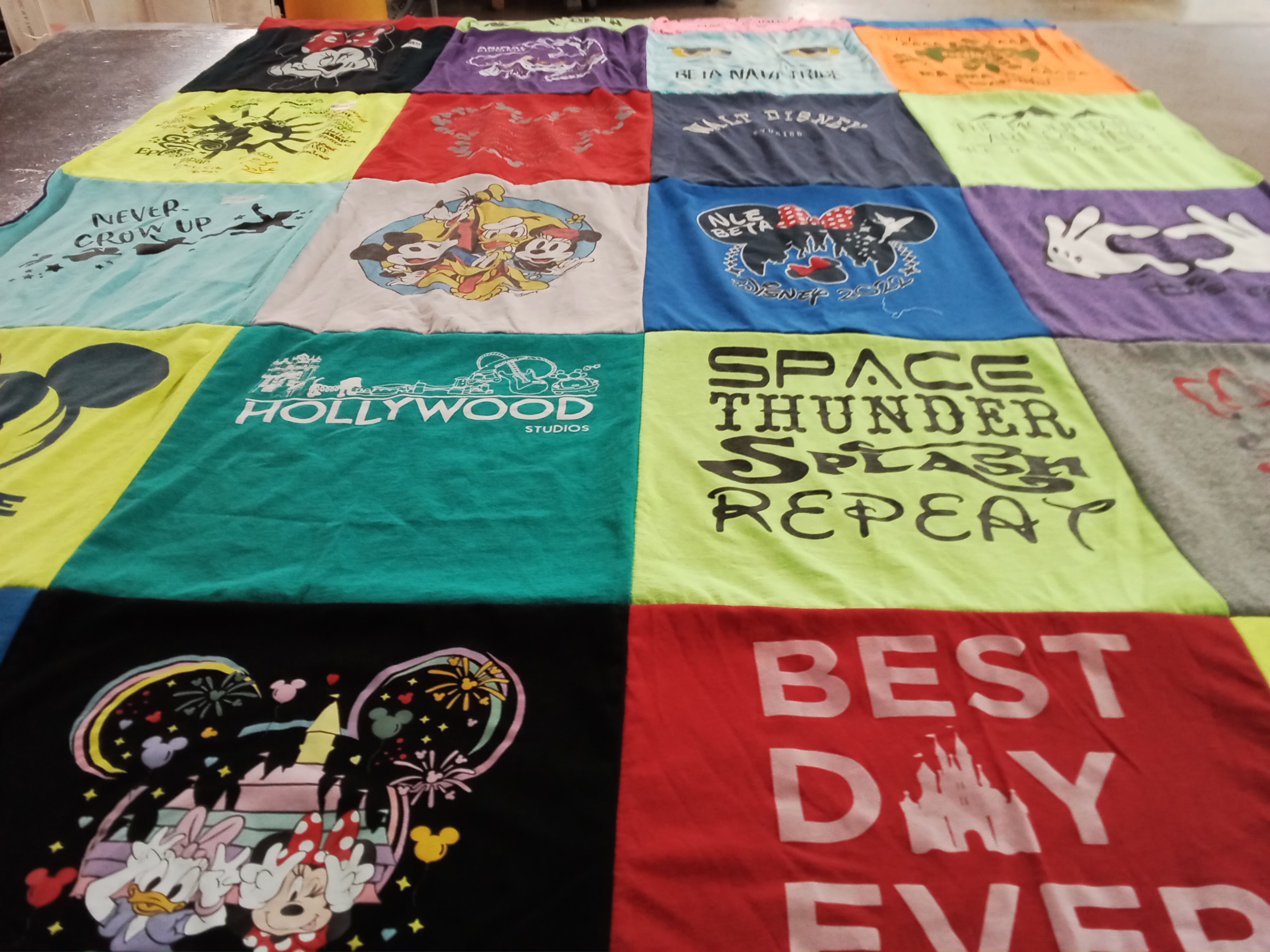 T-shirt quilt with disney, amusement parks themes by Carla from LA