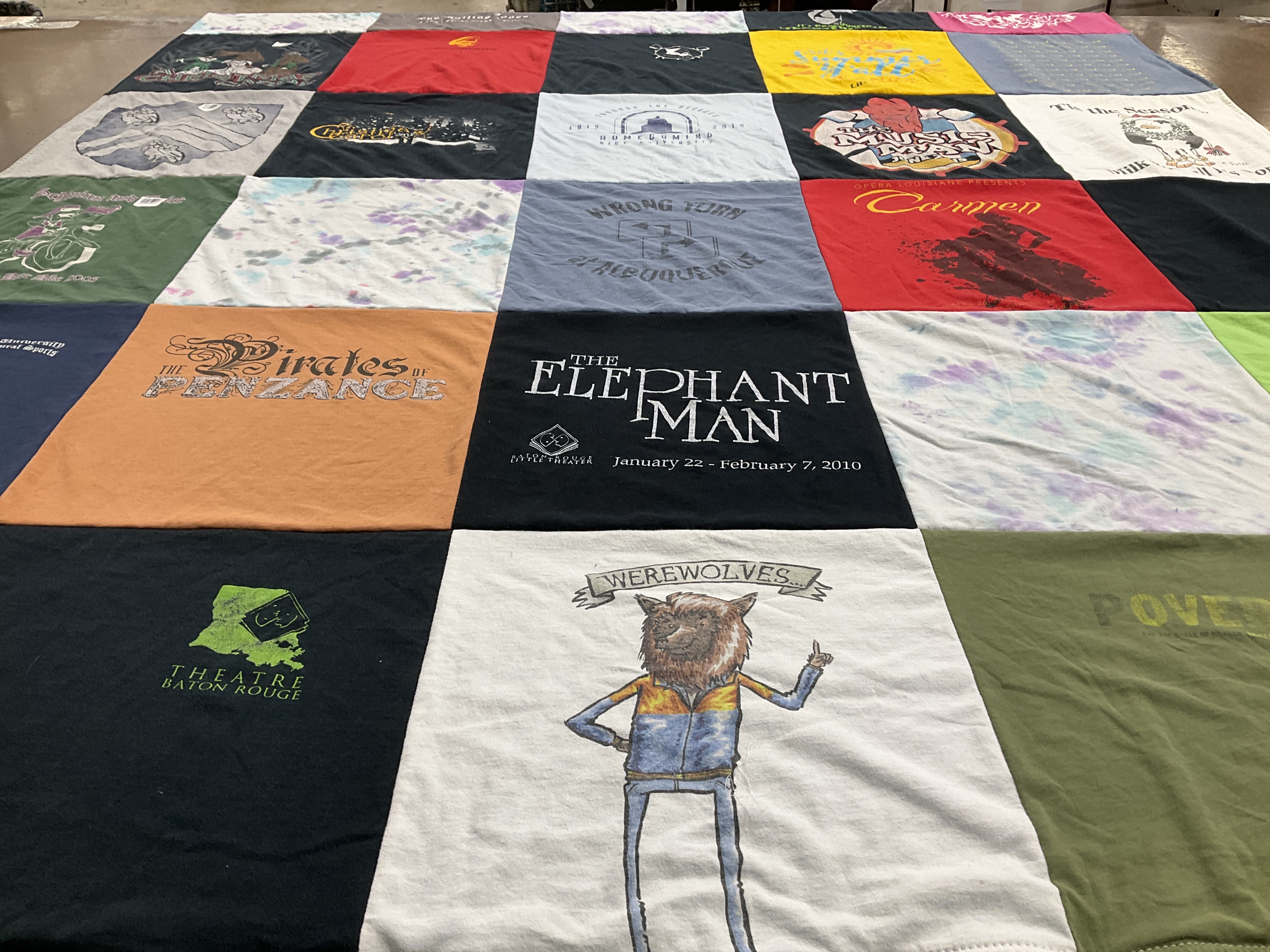 T-shirt quilt with theatre, performance themes by Mary from LA