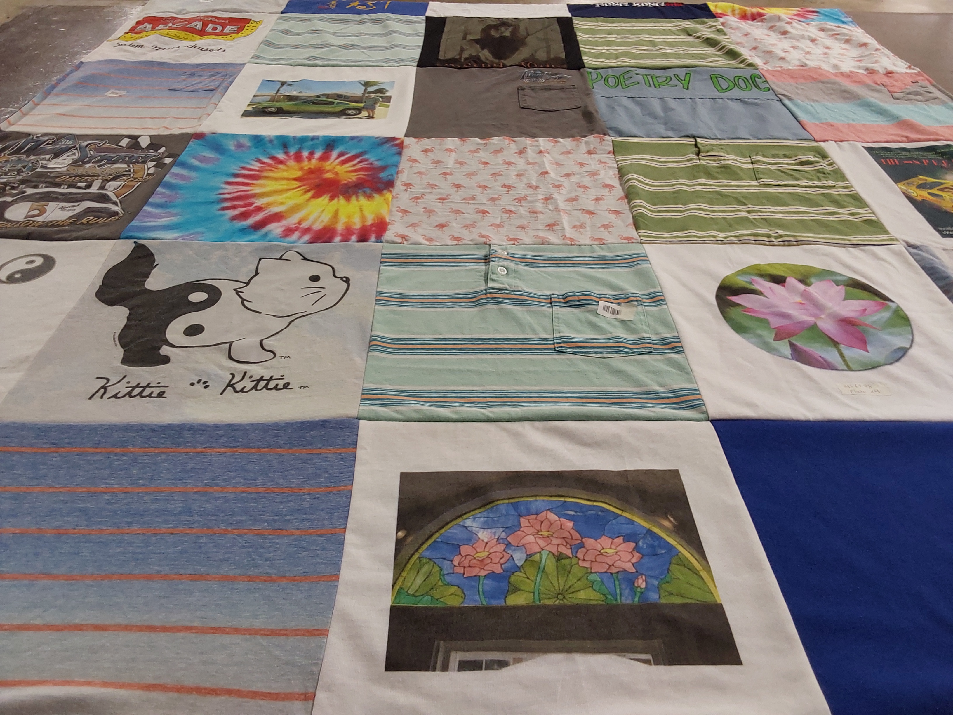 T-shirt quilt with art, poetry themes by Aileen from FL