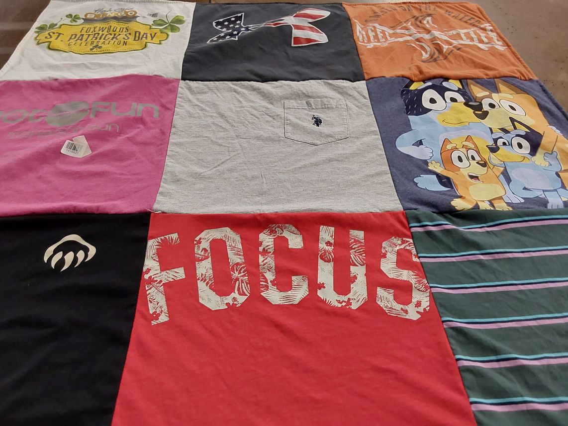 T-shirt quilt with outdoor activities, casual wear themes by Heather from CT