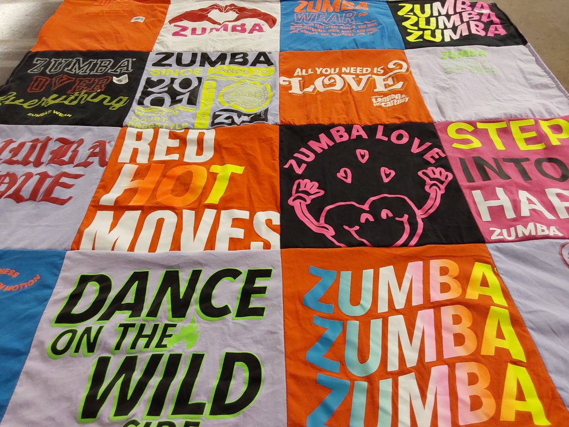 T-shirt quilt with fitness, dance themes by Donna from CA