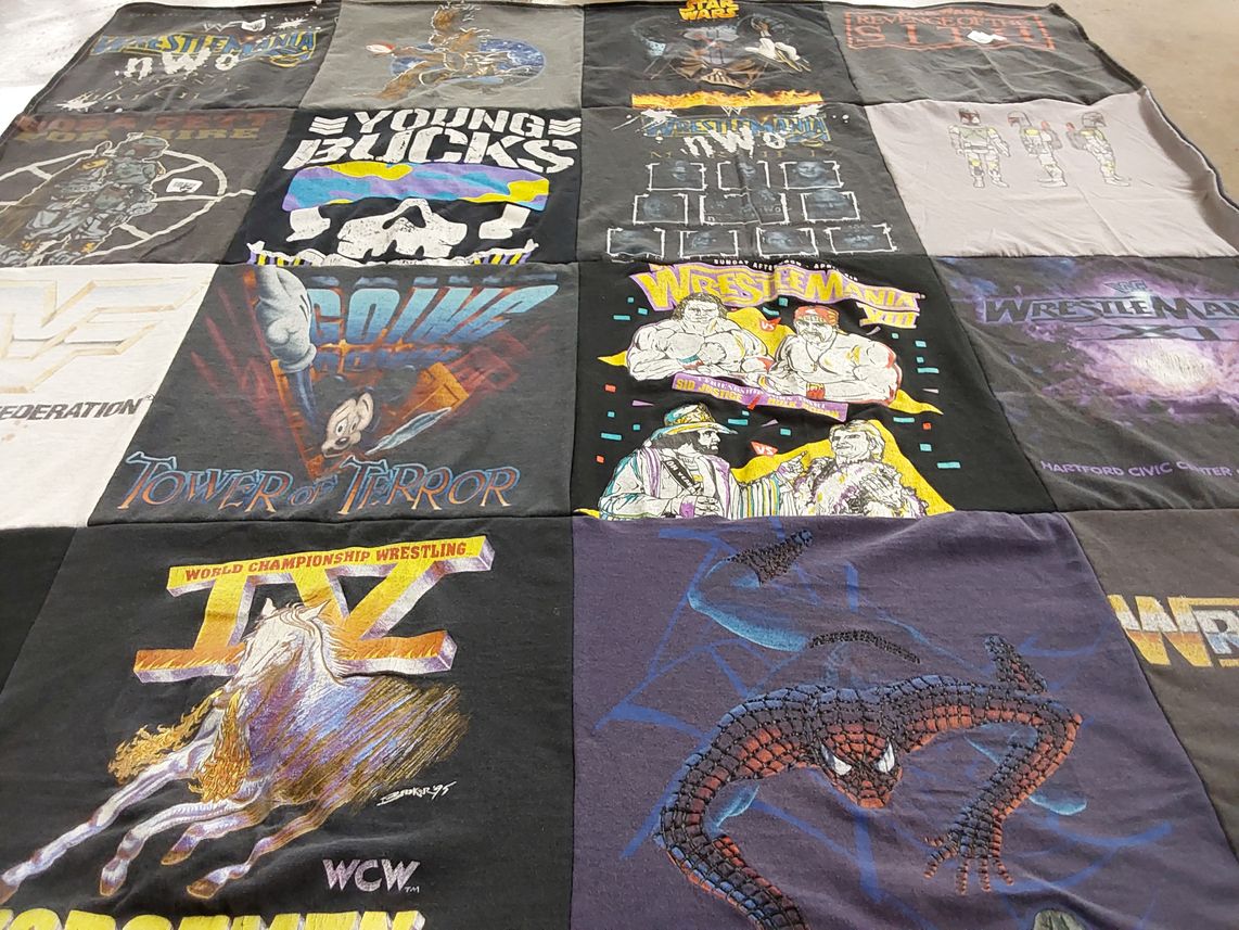 T-shirt quilt with wrestling, amusement themes by Brian from NY