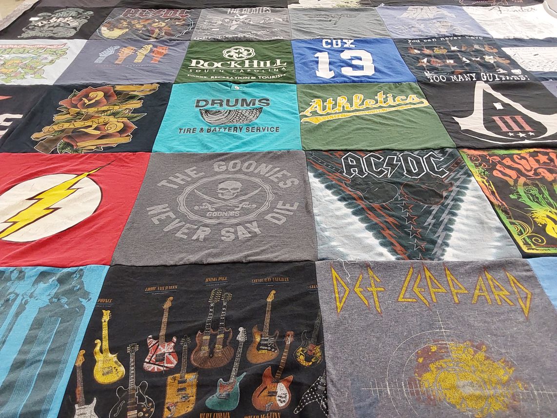 T-shirt quilt with music, movies themes by Derek from SC