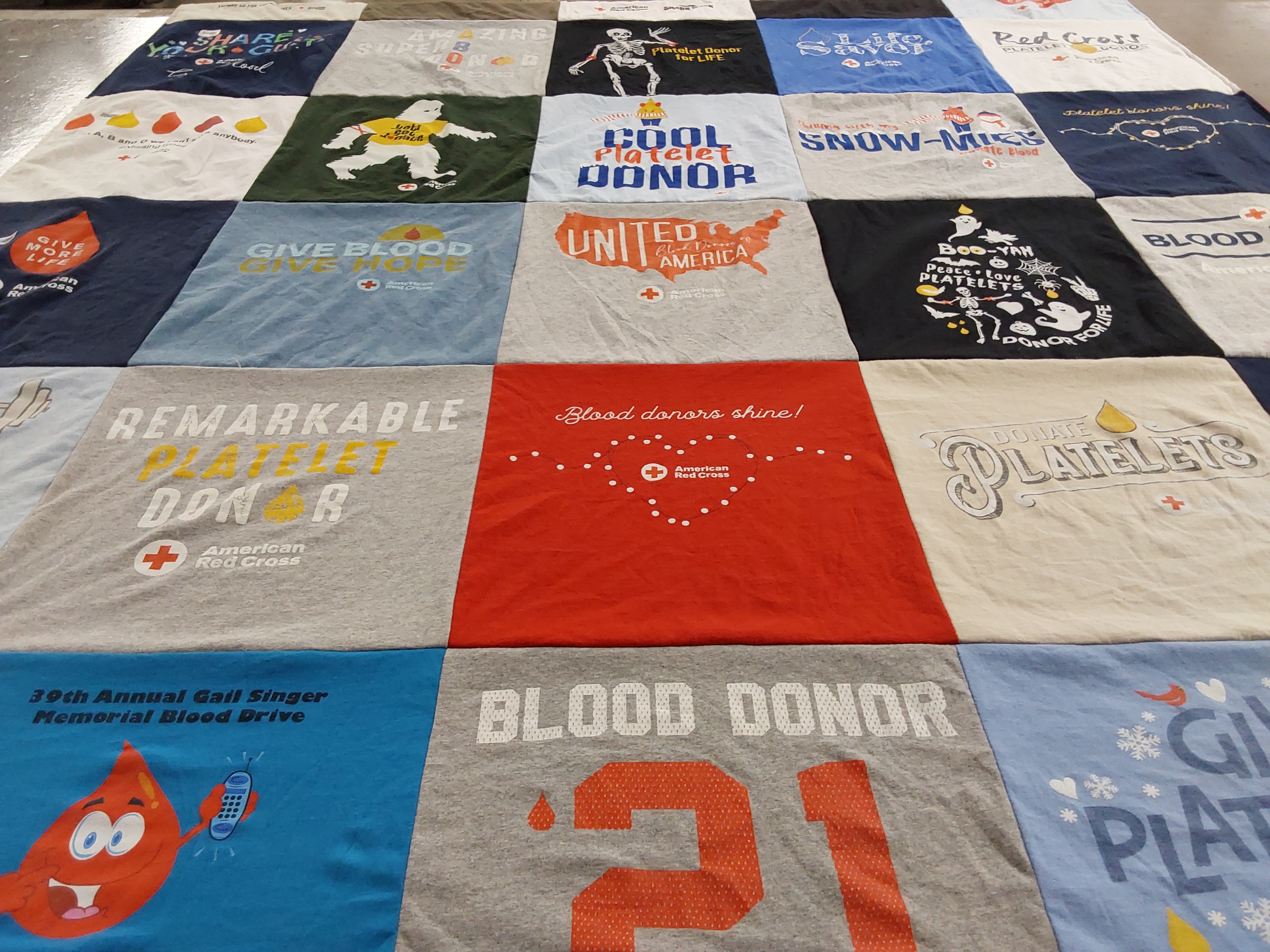 T-shirt quilt with blood donation, community service themes by Jan from NH