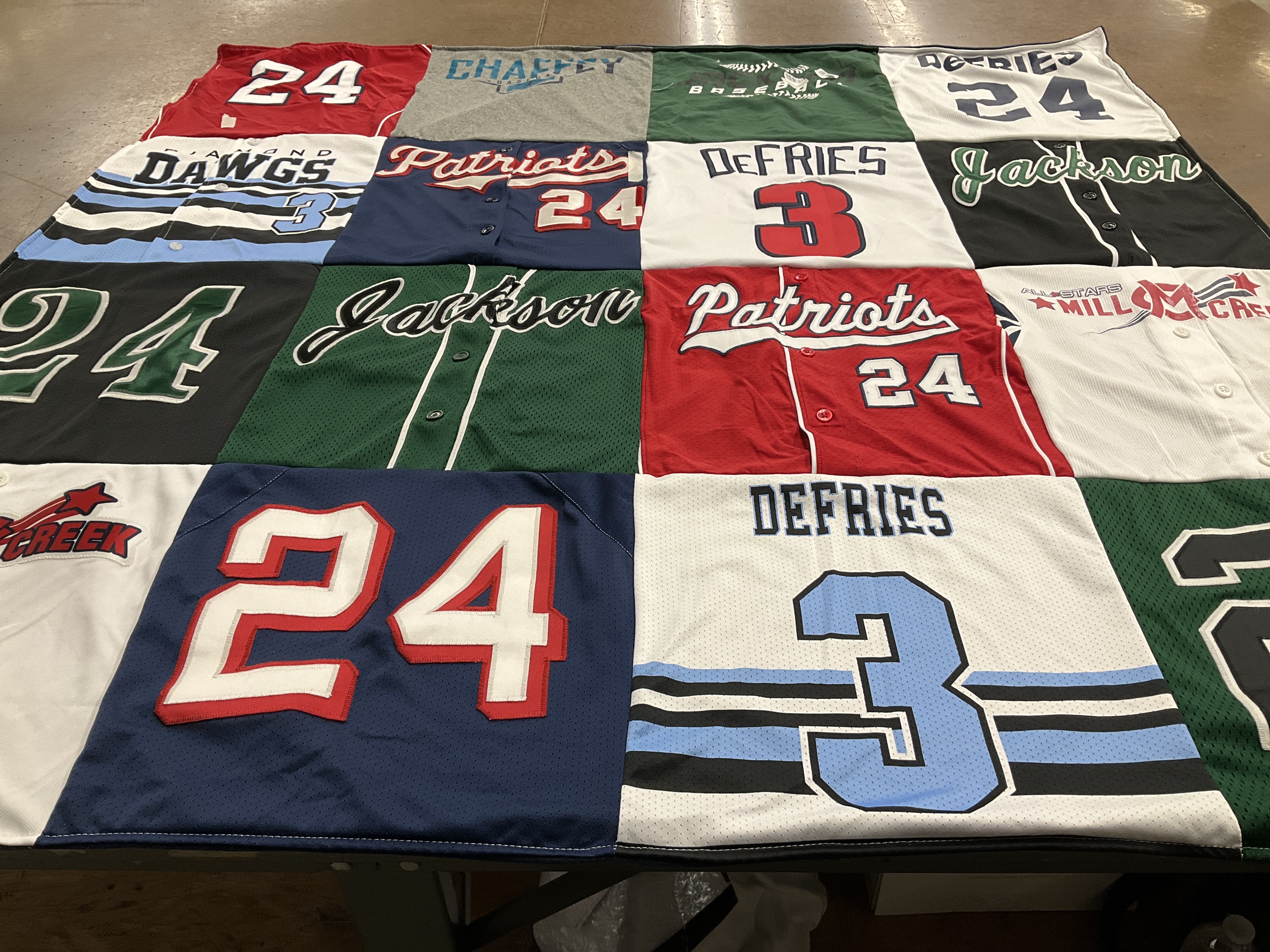 T-shirt quilt with sports themes by Travis from WA