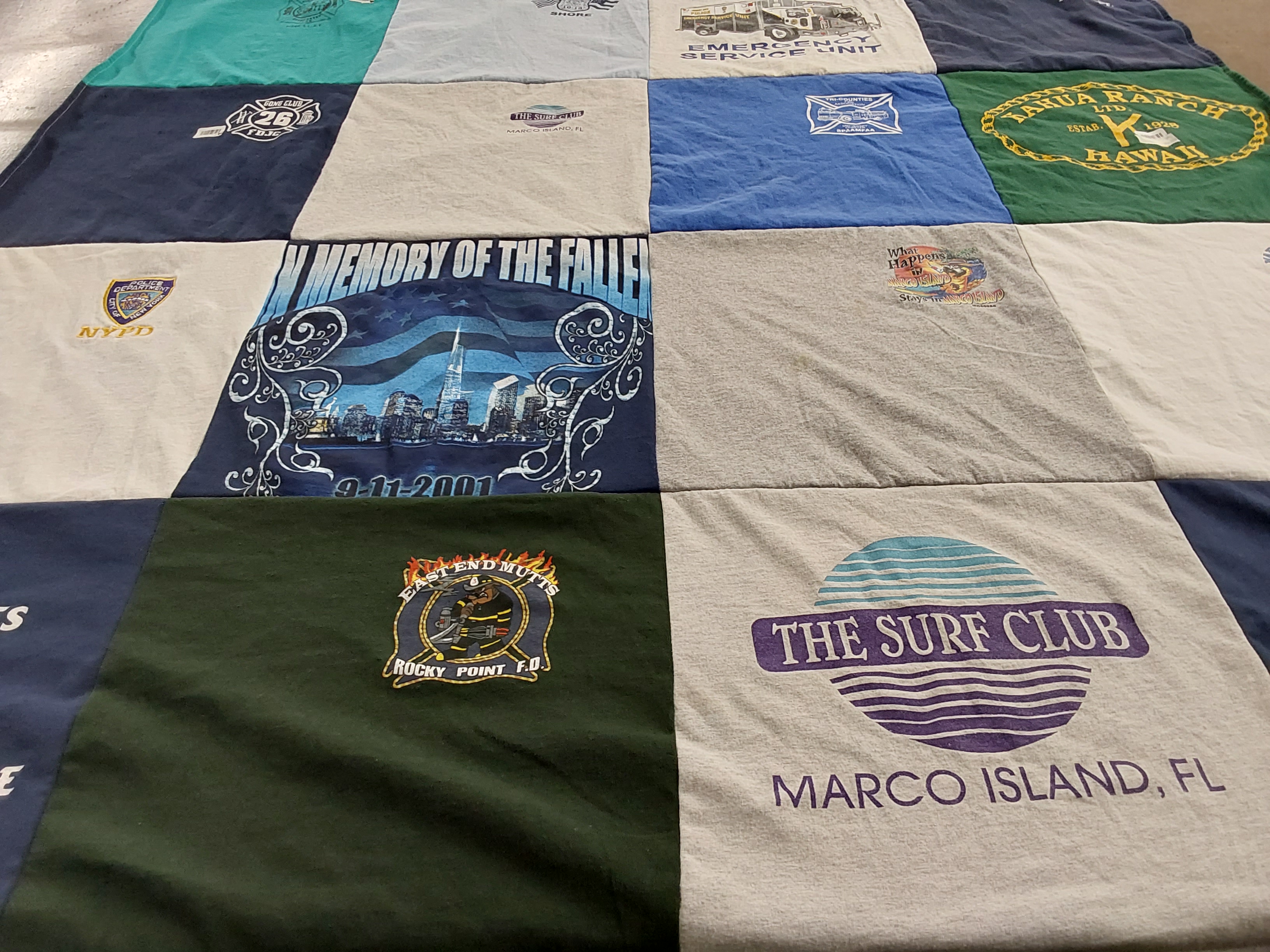 T-shirt quilt with firefighting, law enforcement themes by bob from NY