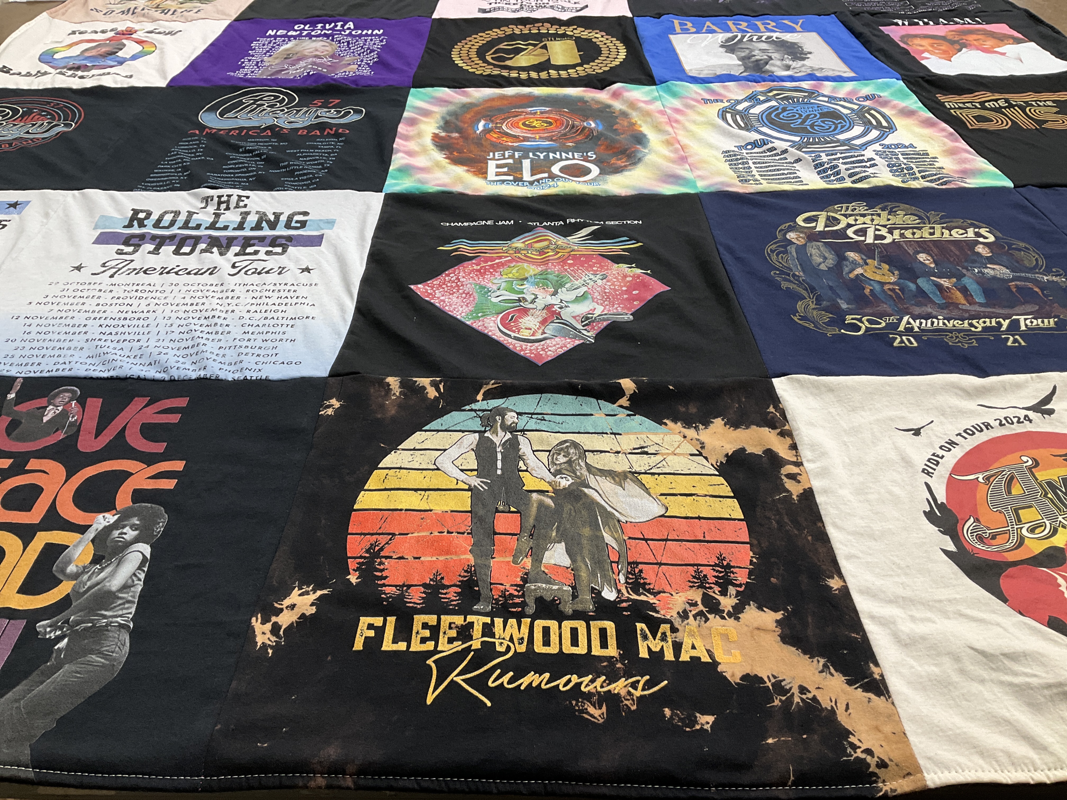 T-shirt quilt with music, concerts themes by Kathy from TX