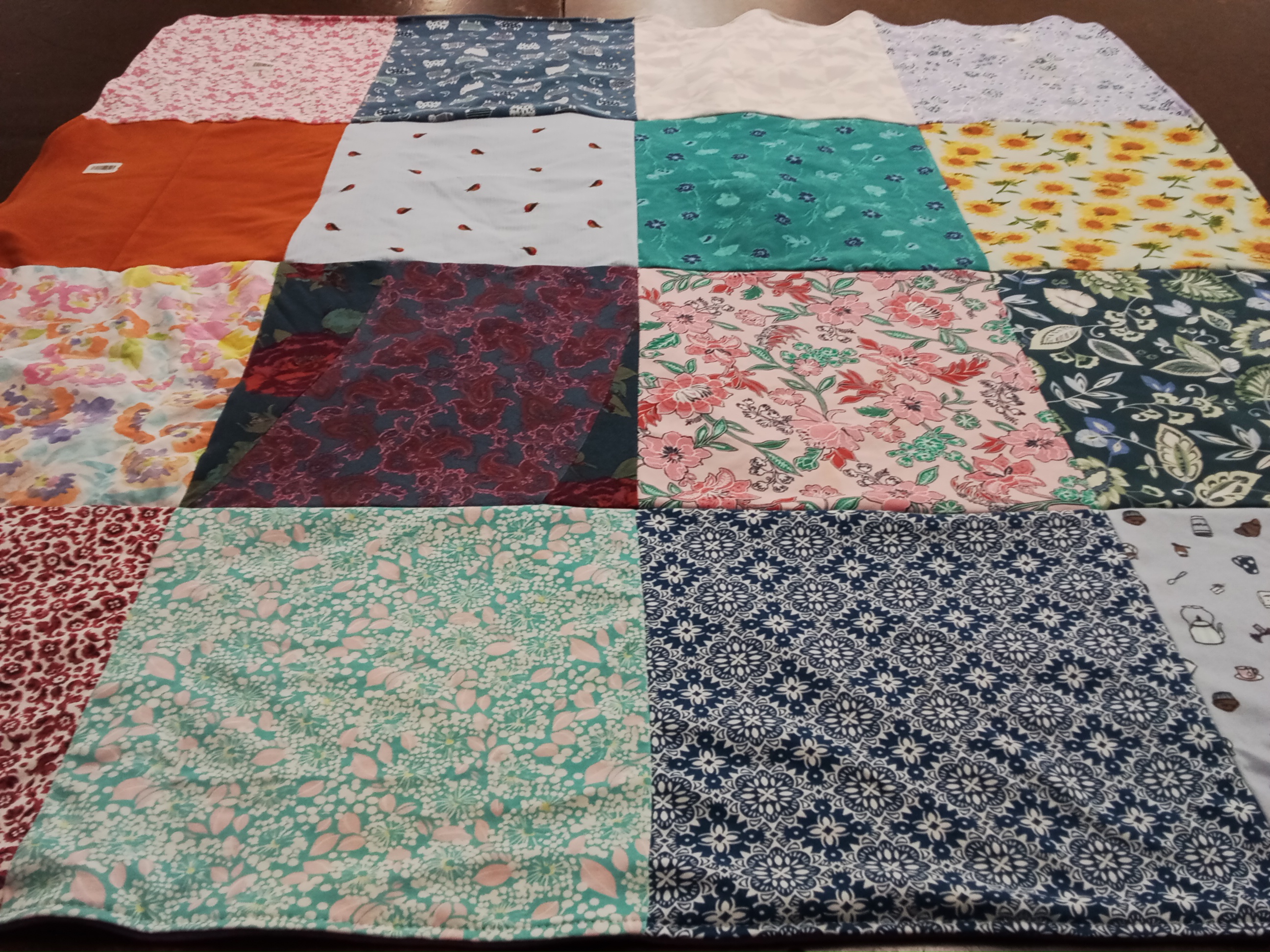 T-shirt quilt with sewing, crafting themes by Katie from CA