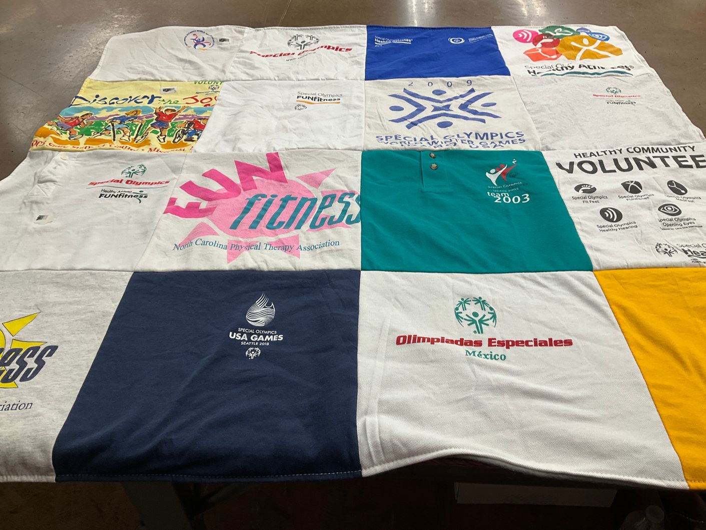 T-shirt quilt with sports, fitness themes by Donna from MT