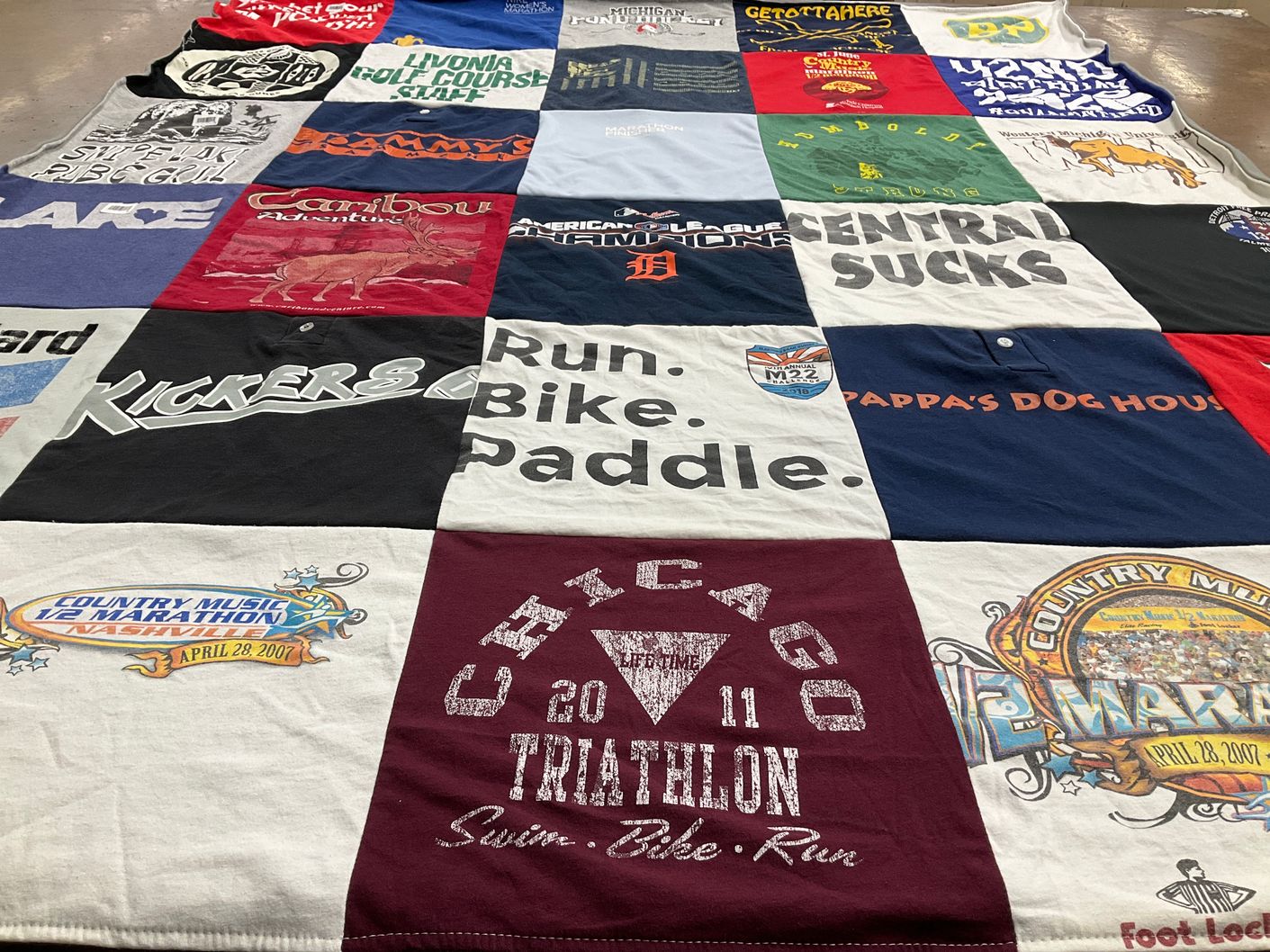 T-shirt quilt with running, cycling themes by Przysiecki from MI
