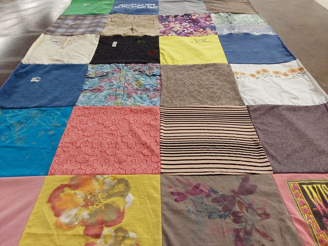 T-shirt quilt with fashion, textiles themes by Sara from WI