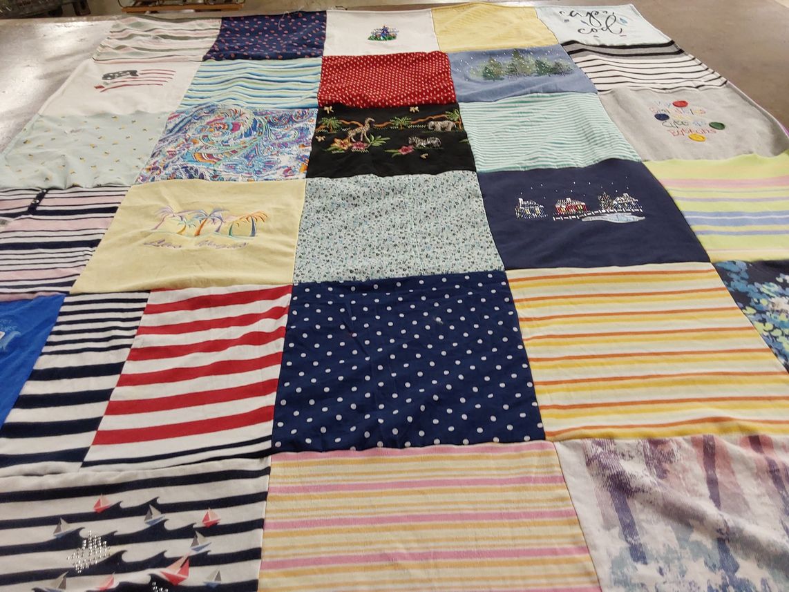 T-shirt quilt with beach, travel themes by Molly from IN