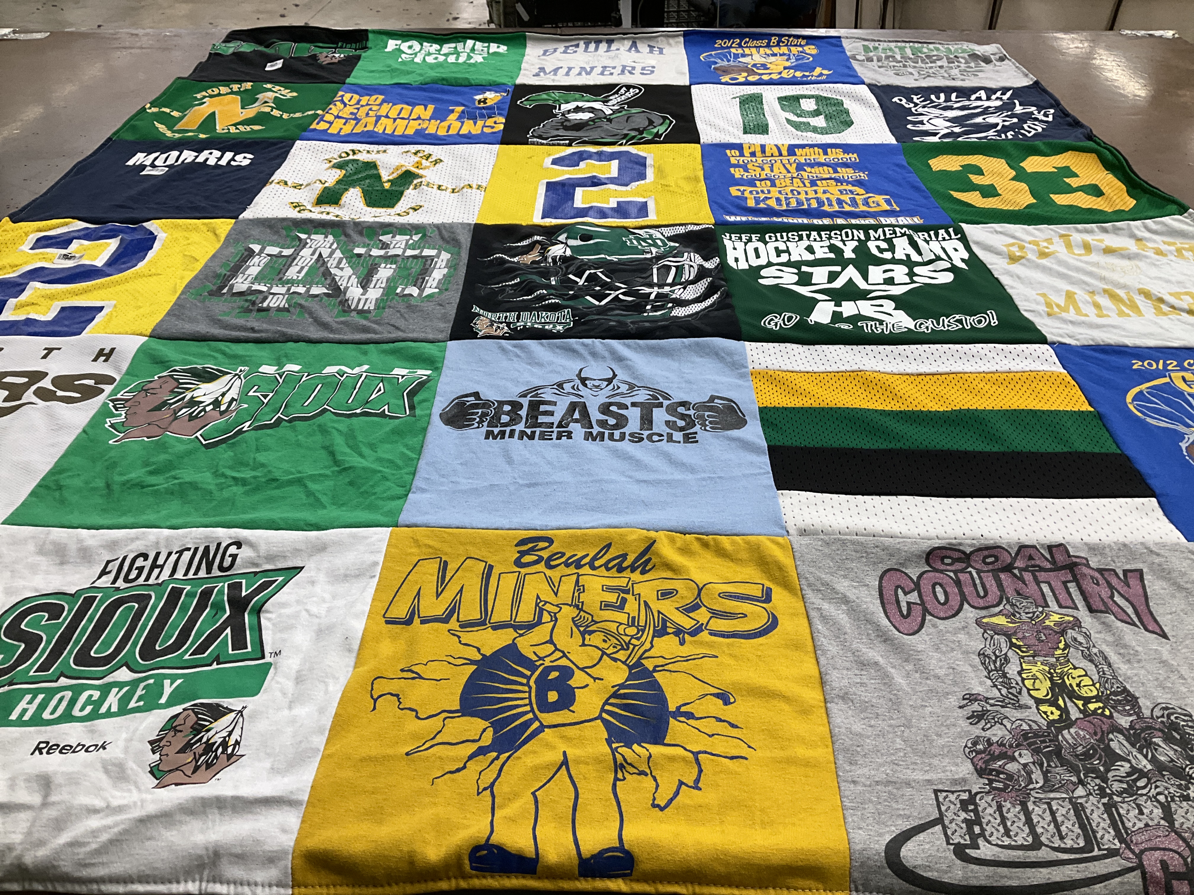 T-shirt quilt featuring beulah miners, fighting sioux hockey by Brooke from ND